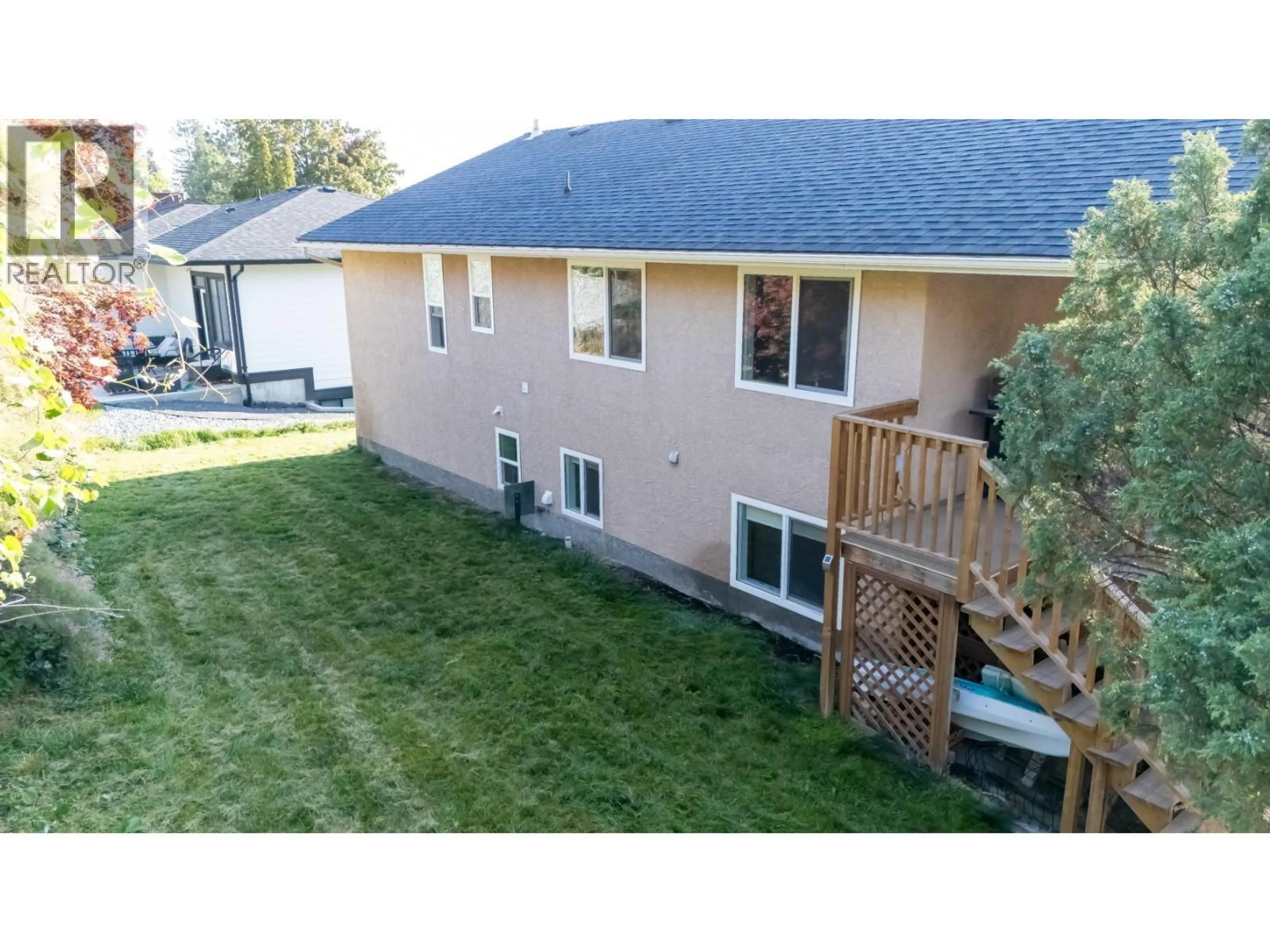 A pic from outside/outdoor area/front of a property/back of a property/a pic from drone, water/lake/river/ocean view for 1556 BLACKWOOD DRIVE, West Kelowna British Columbia V1Z3B7