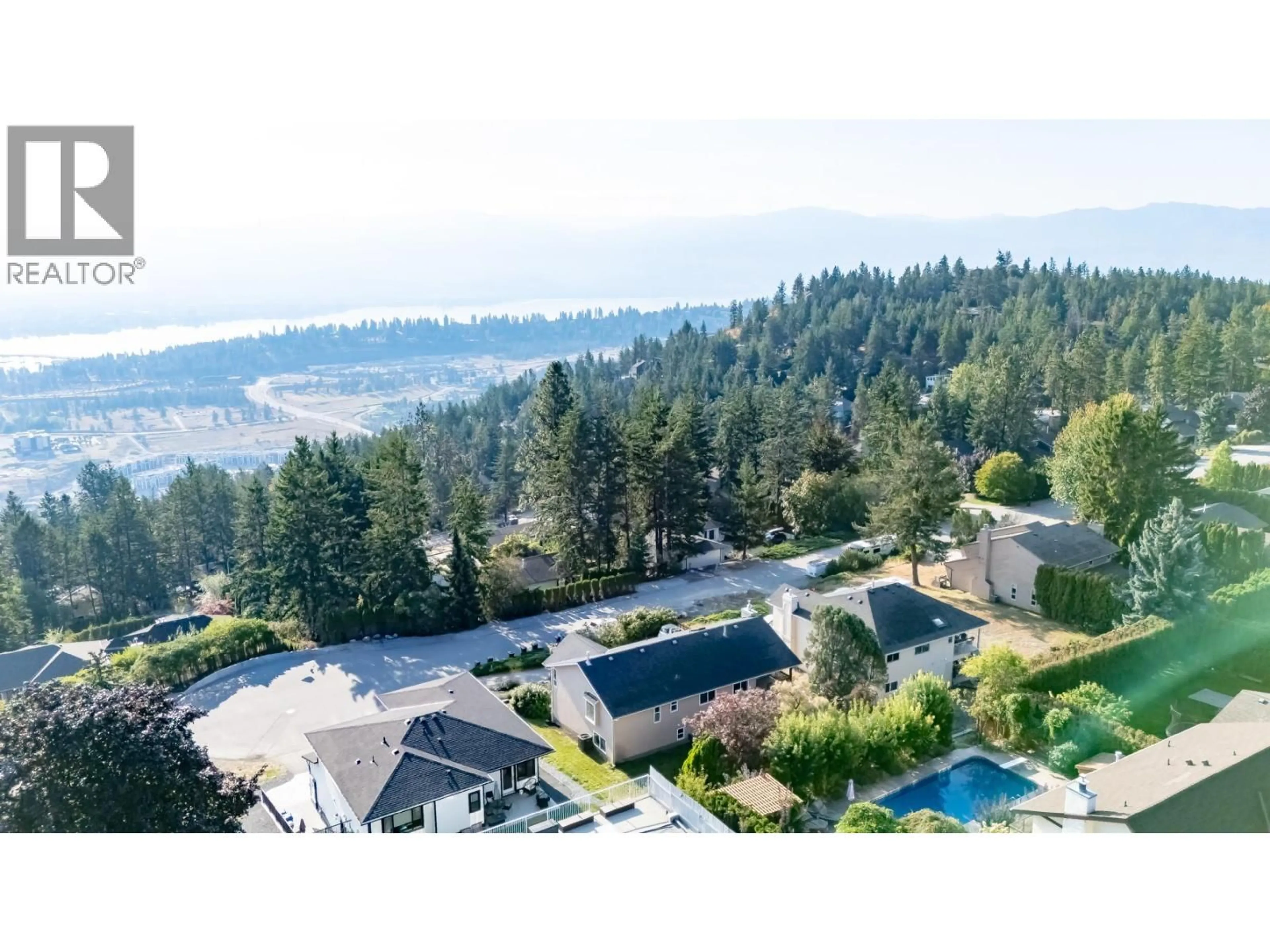 A pic from outside/outdoor area/front of a property/back of a property/a pic from drone, water/lake/river/ocean view for 1556 BLACKWOOD DRIVE, West Kelowna British Columbia V1Z3B7