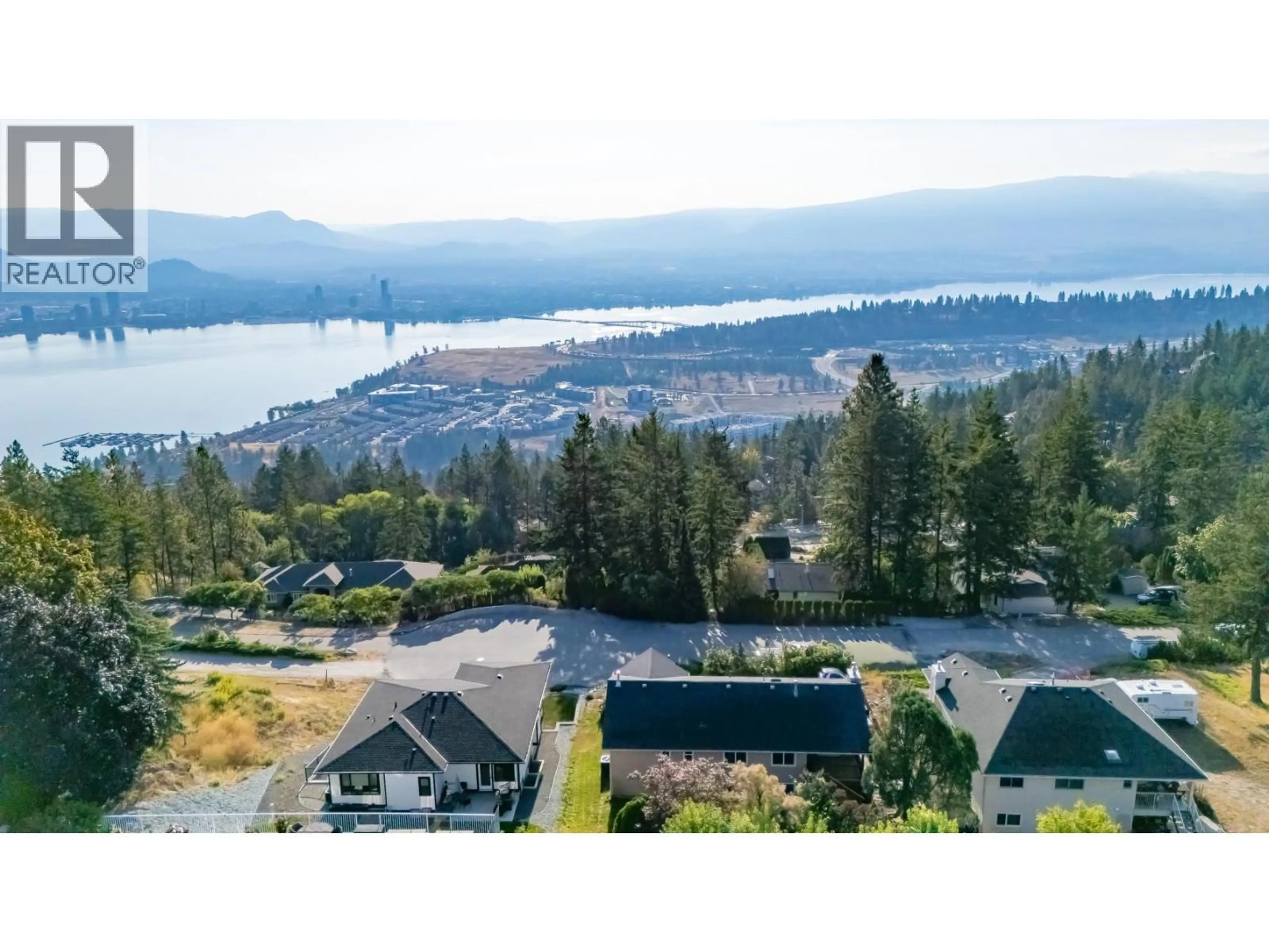 A pic from outside/outdoor area/front of a property/back of a property/a pic from drone, water/lake/river/ocean view for 1556 BLACKWOOD DRIVE, West Kelowna British Columbia V1Z3B7