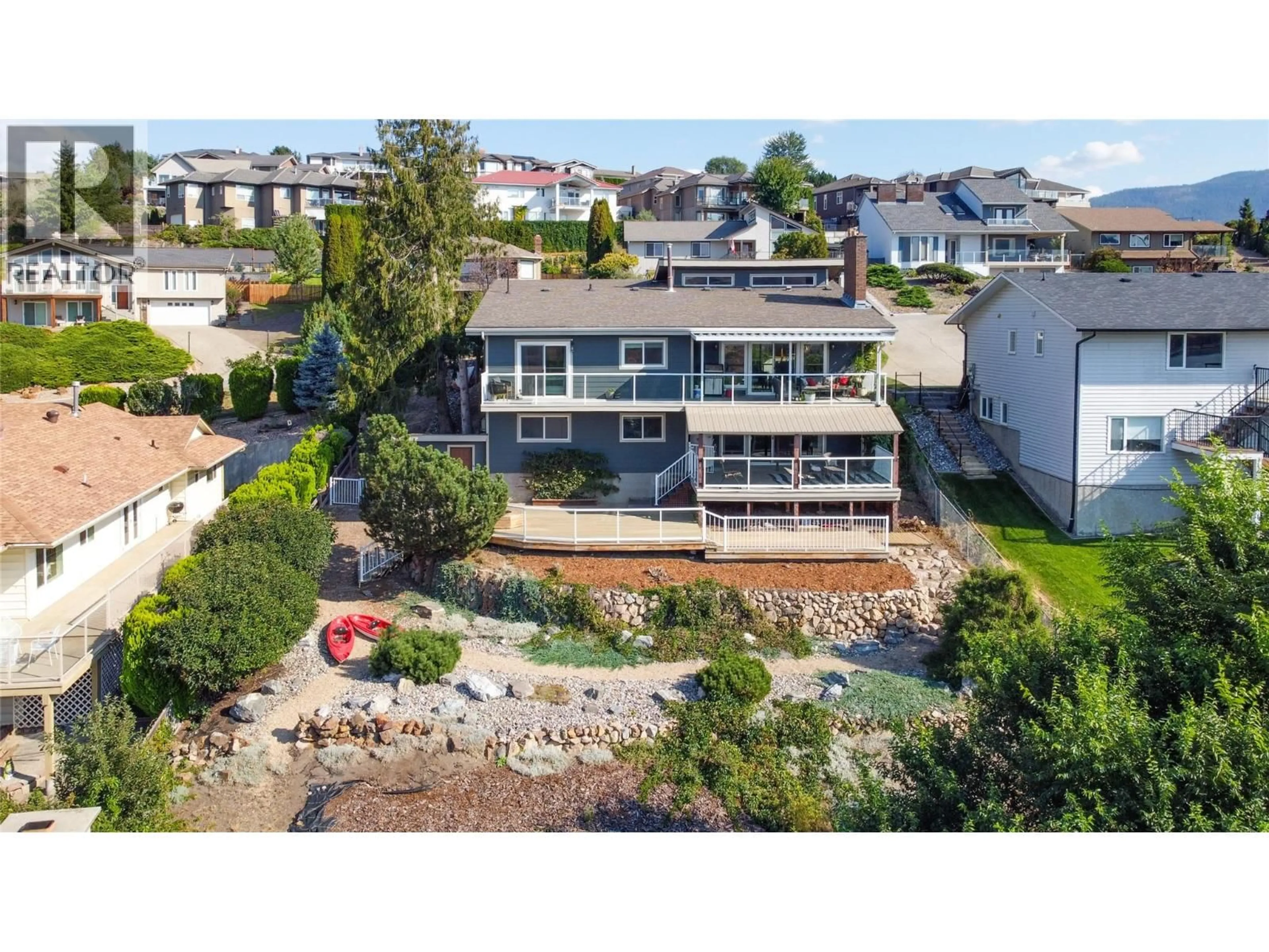 A pic from outside/outdoor area/front of a property/back of a property/a pic from drone, unknown for 8818 SUNFLOWER PLACE, Coldstream British Columbia V1B2G2