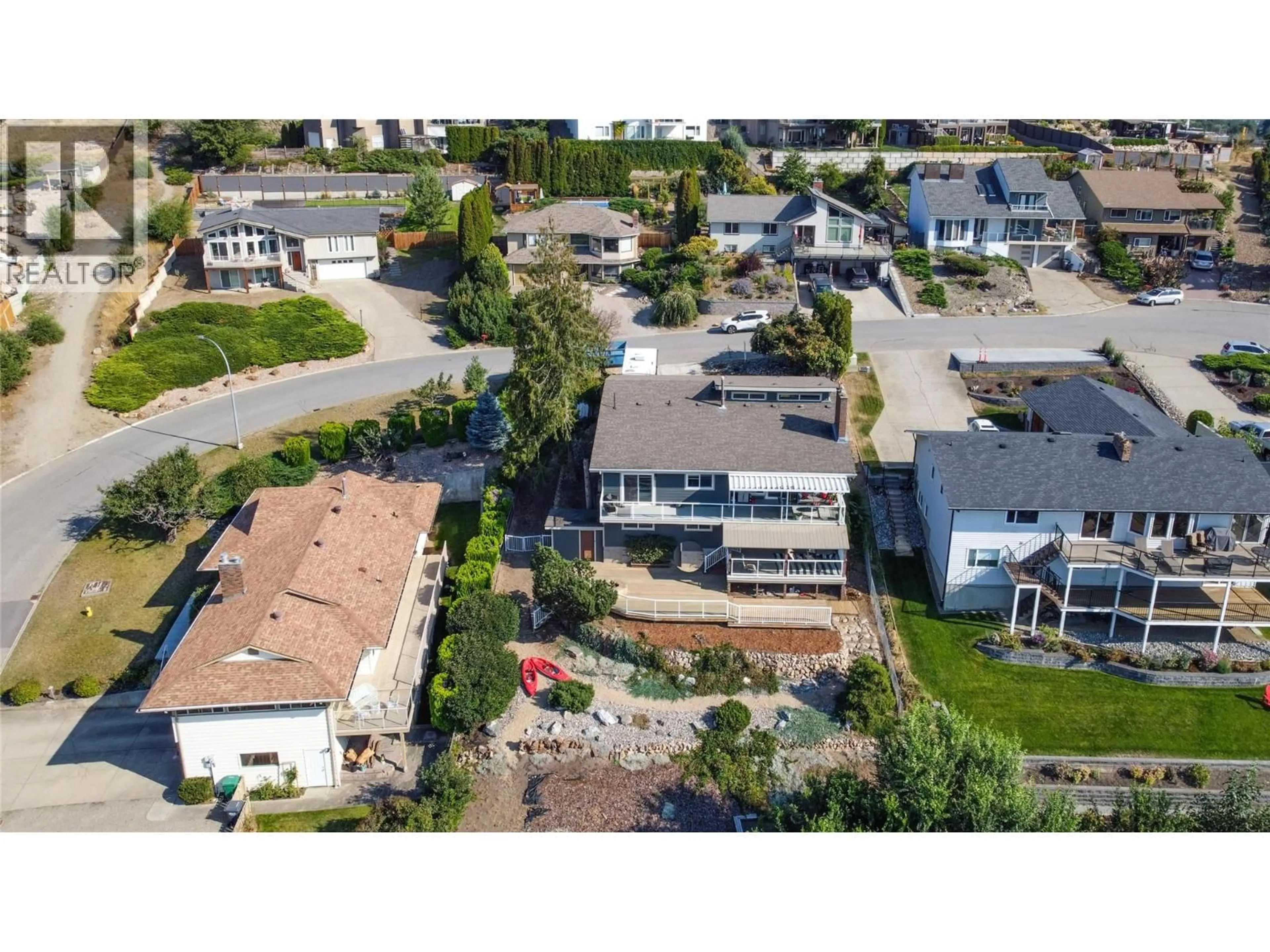 A pic from outside/outdoor area/front of a property/back of a property/a pic from drone, street for 8818 SUNFLOWER PLACE, Coldstream British Columbia V1B2G2