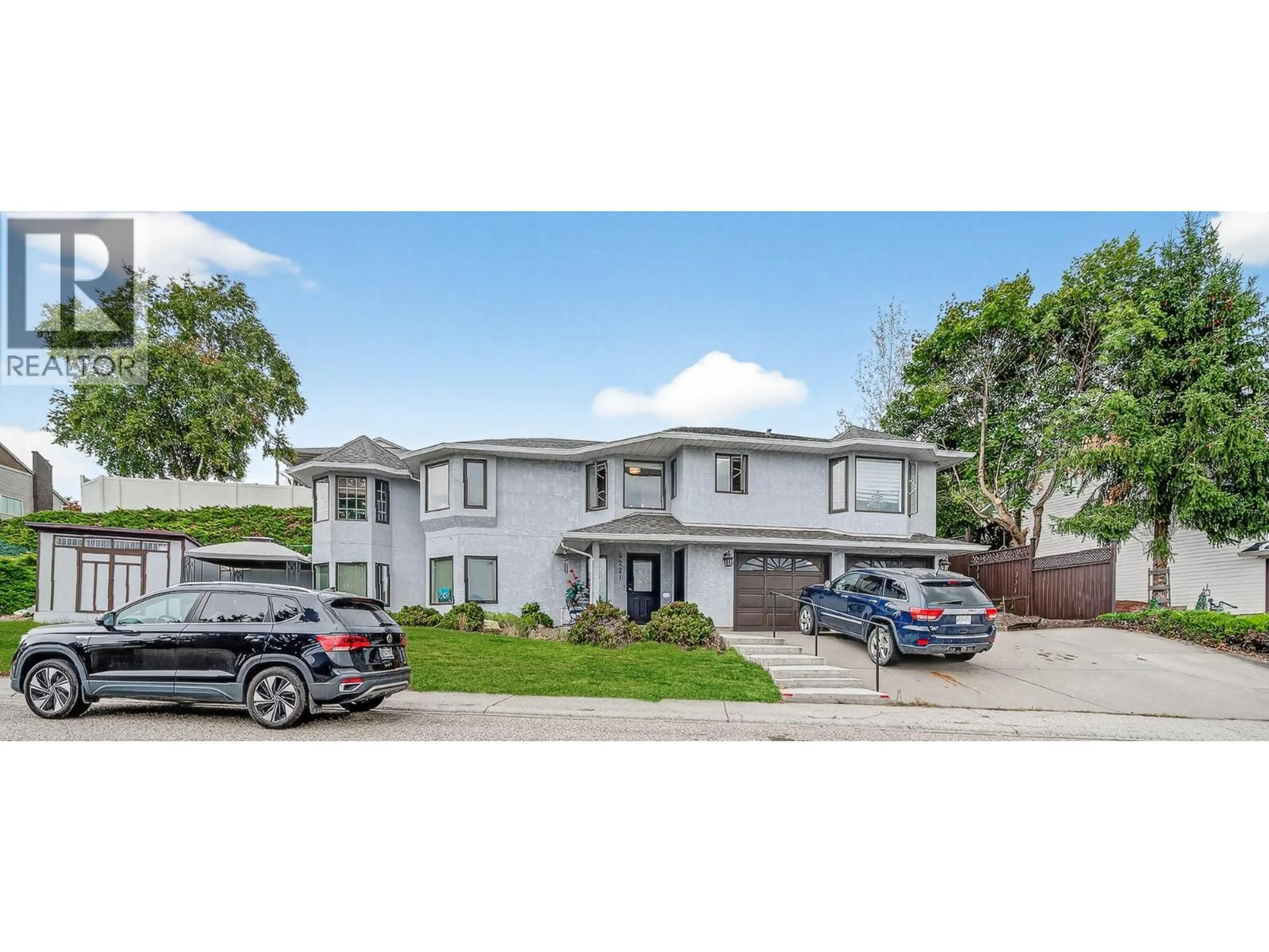A pic from outside/outdoor area/front of a property/back of a property/a pic from drone, street for 4221 WELLINGTON DRIVE, Vernon British Columbia V1T9H7