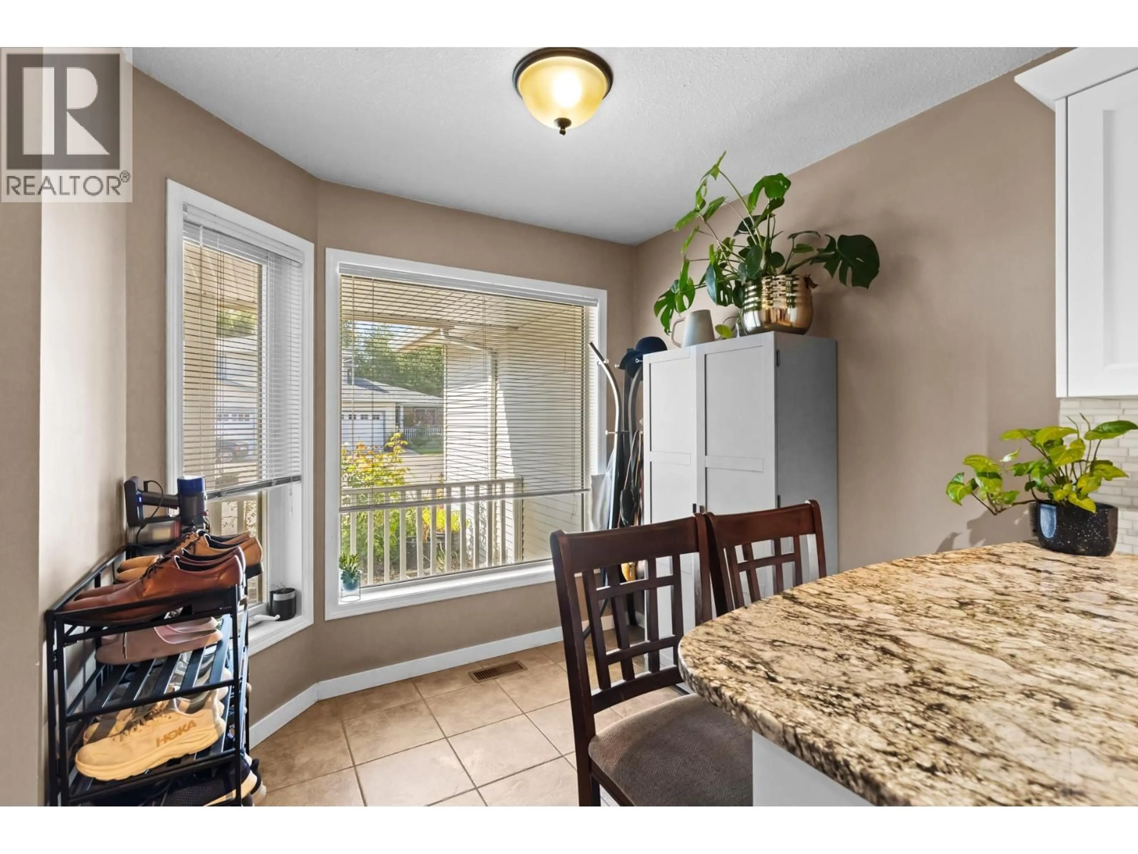 Open concept kitchen, ceramic/tile floor for 82 - 1120 GUISACHAN ROAD, Kelowna British Columbia V1Y9R5