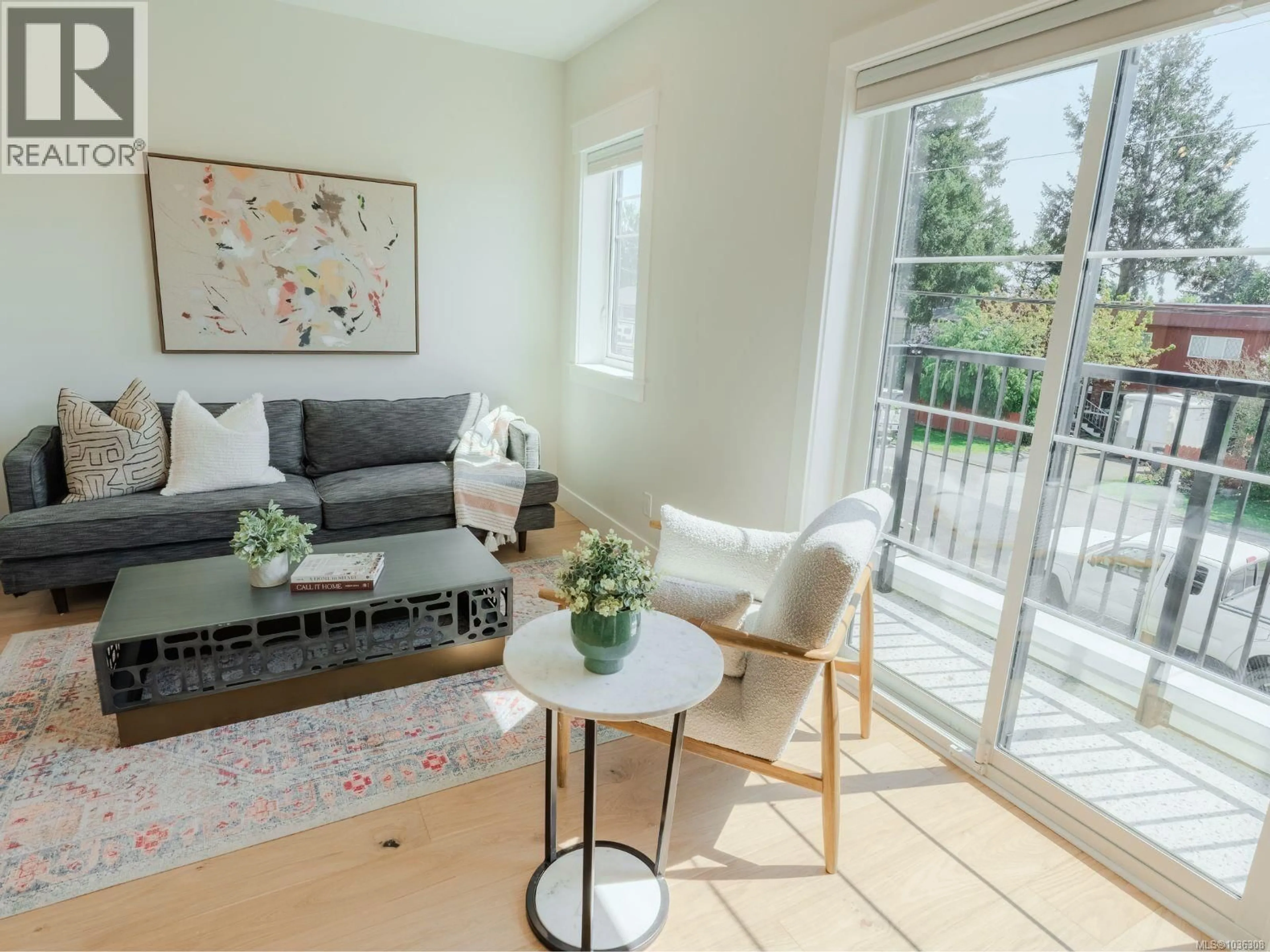 Living room with furniture, wood/laminate floor for 5 - 1830 ALLENBY STREET, Saanich British Columbia V8R3B7