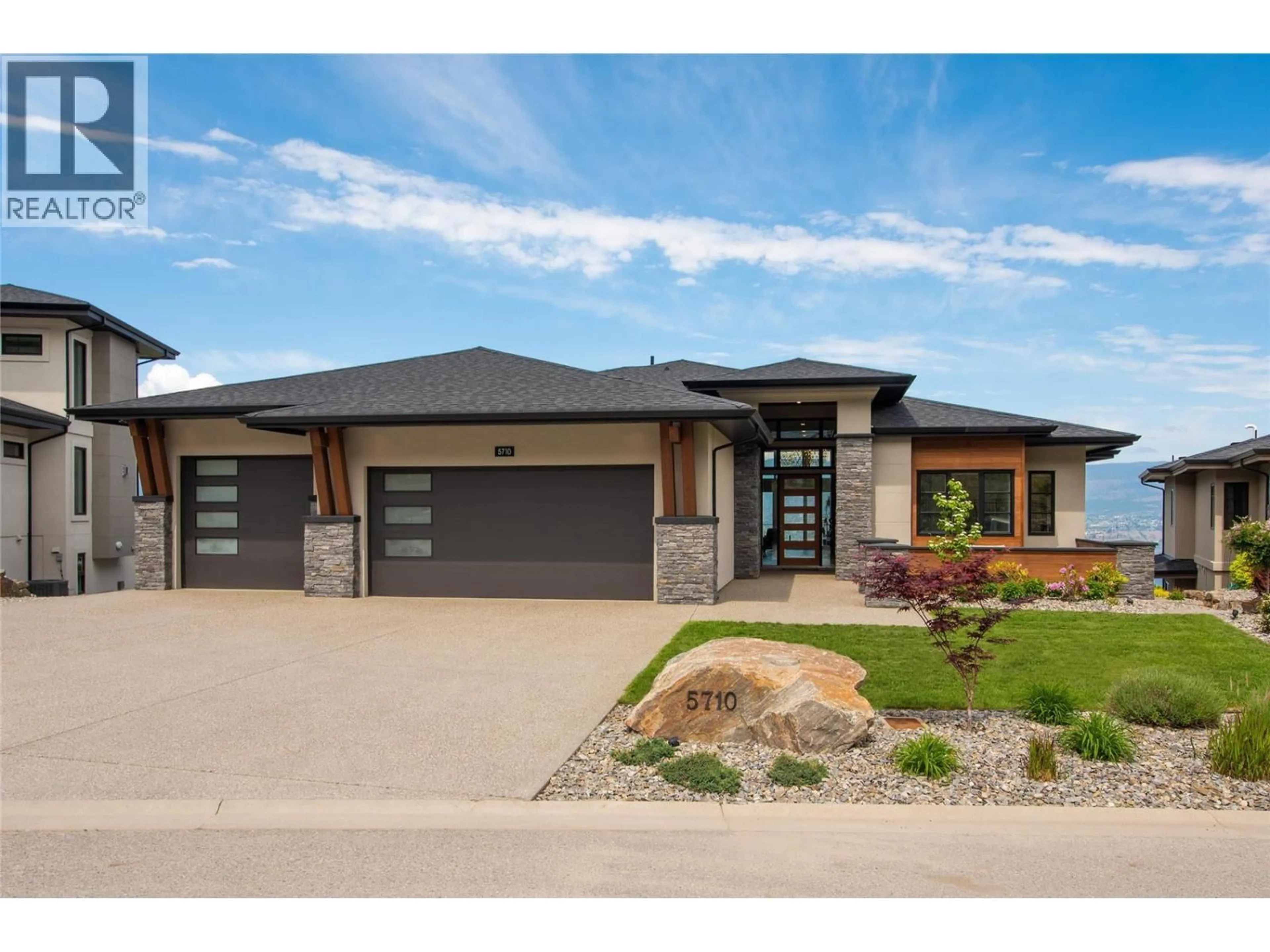 Home with brick exterior material, street for 5710 JASPER WAY, Kelowna British Columbia V1W5L7