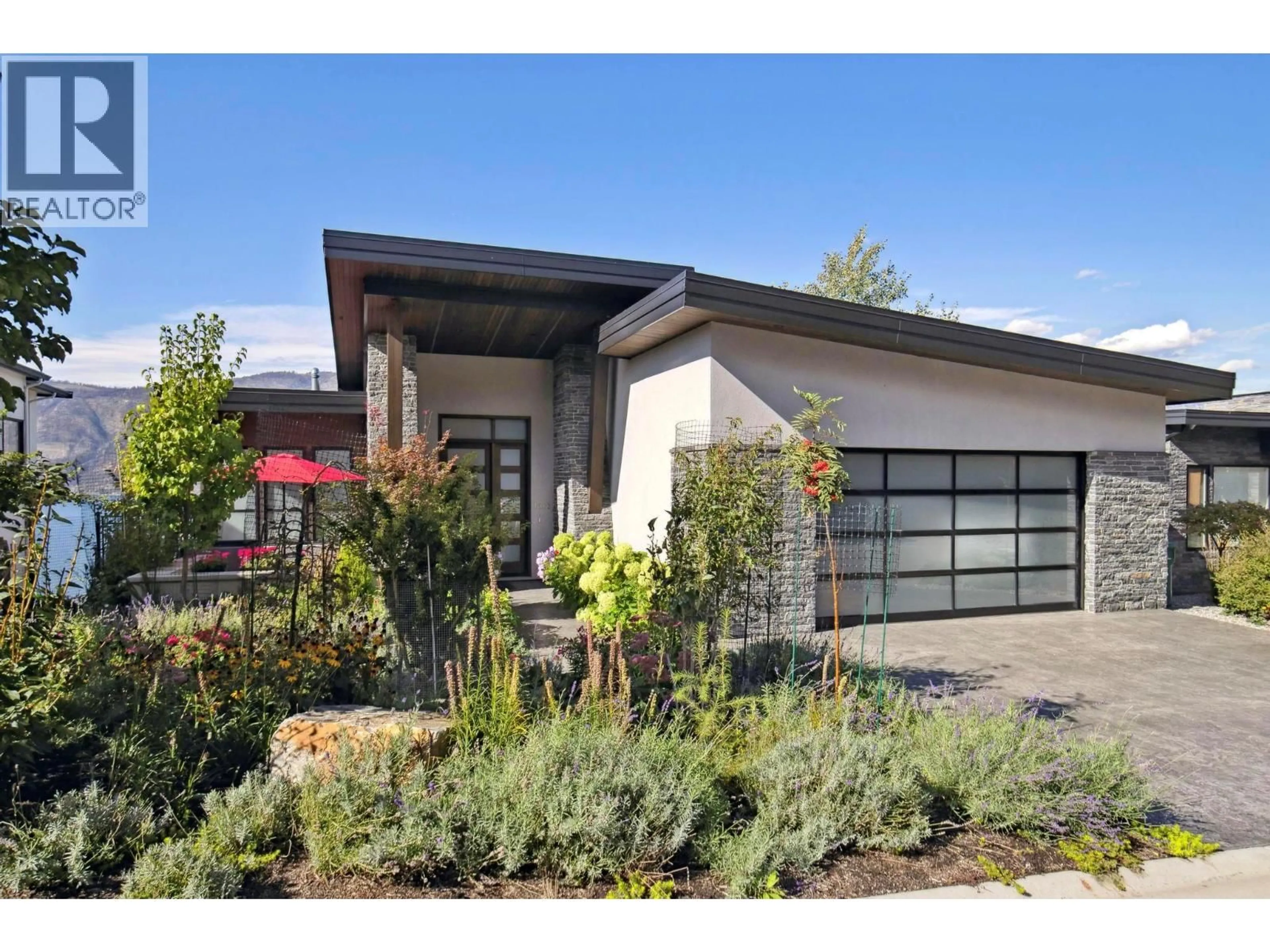 Home with brick exterior material, street for 1612 KIMBERLITE DRIVE, Lake Country British Columbia V4V2T4