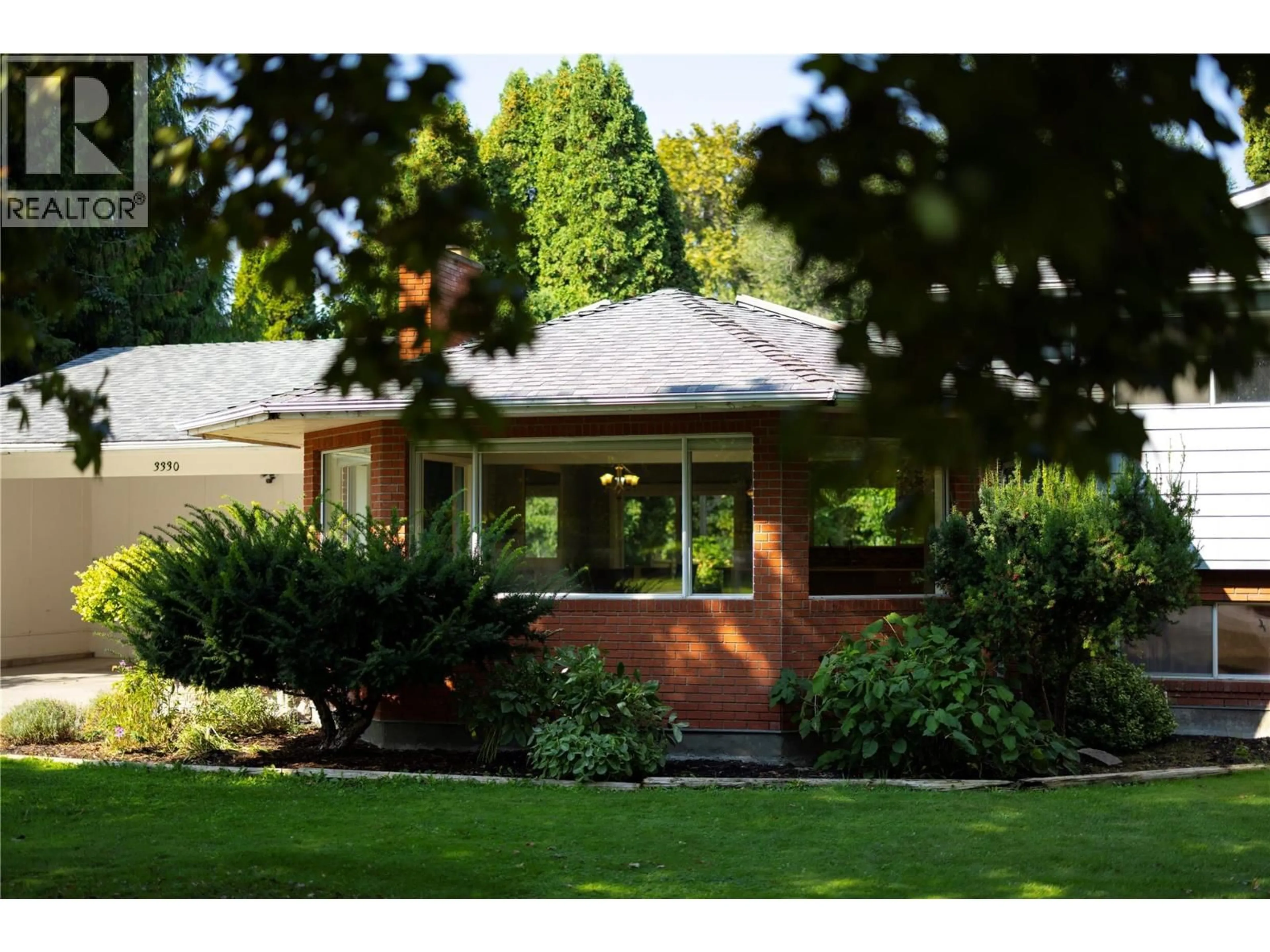 Home with brick exterior material, street for 3330 JACKSON COURT, Kelowna British Columbia V1W2T6