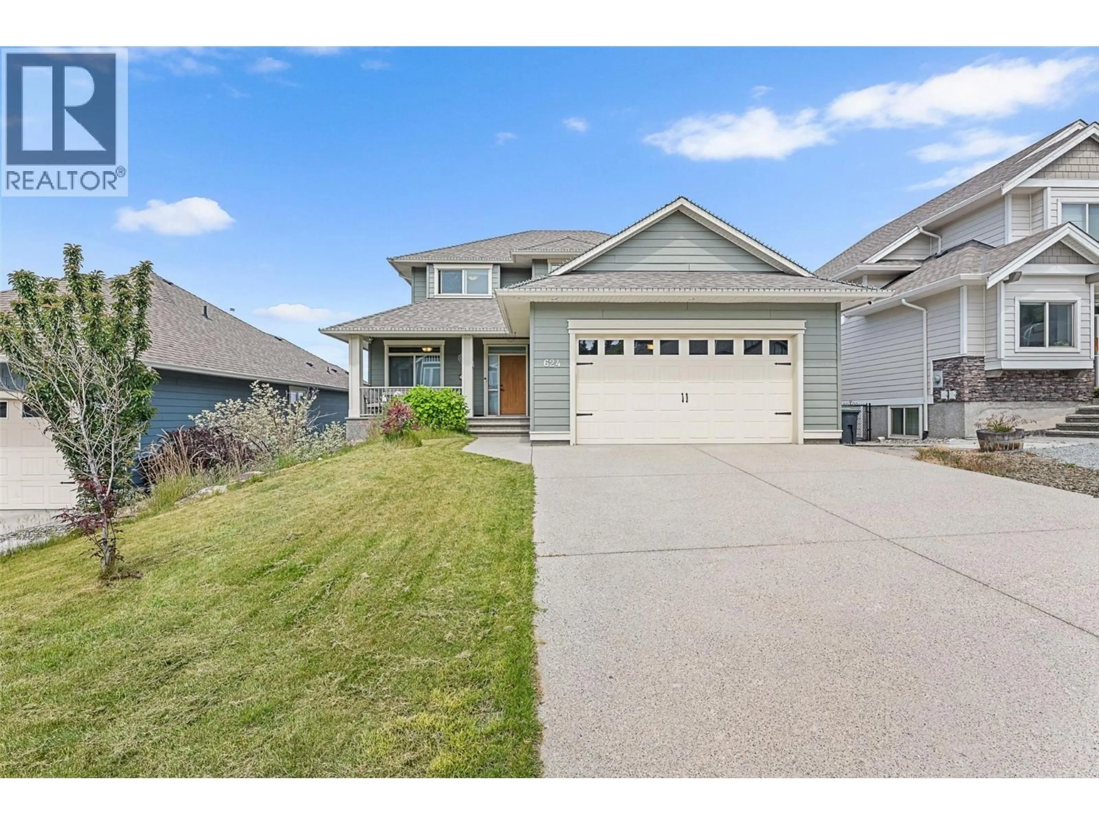 Home with vinyl exterior material, street for 624 LEFEVERE AVENUE, Kelowna British Columbia V1W5G7