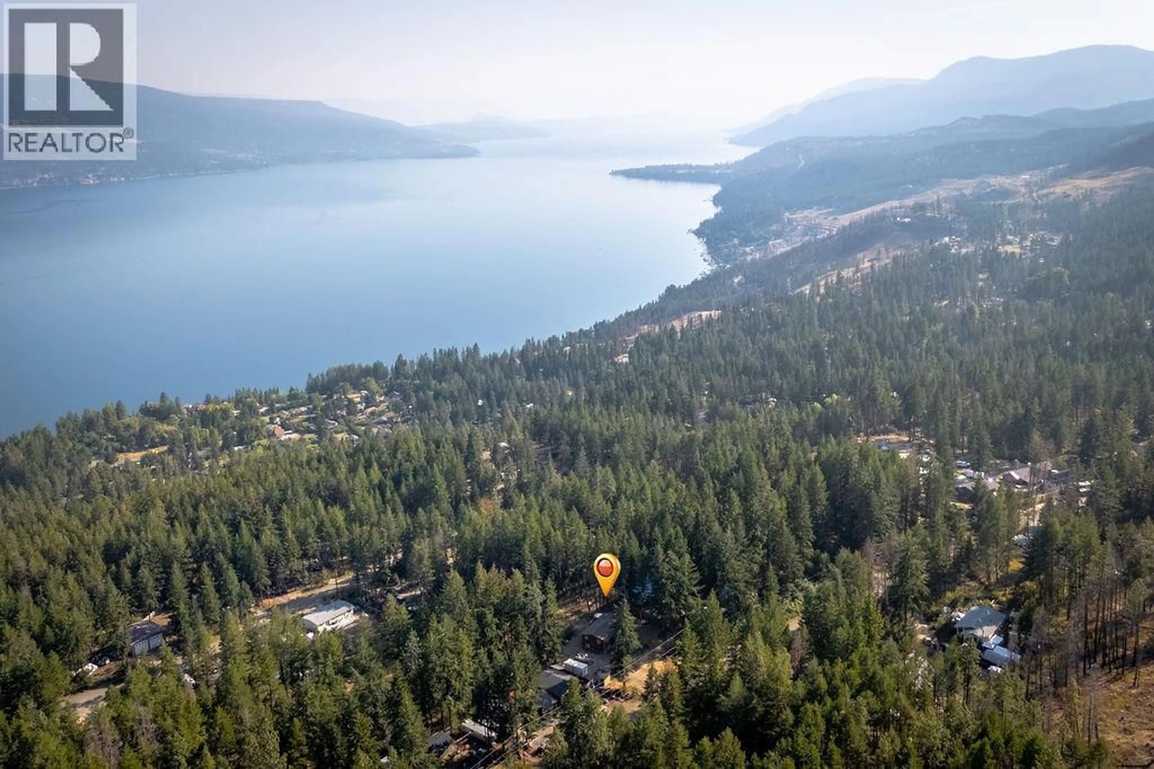 A pic from outside/outdoor area/front of a property/back of a property/a pic from drone, water/lake/river/ocean view for 9633 HOUGHTON ROAD, Vernon British Columbia V1H2C9