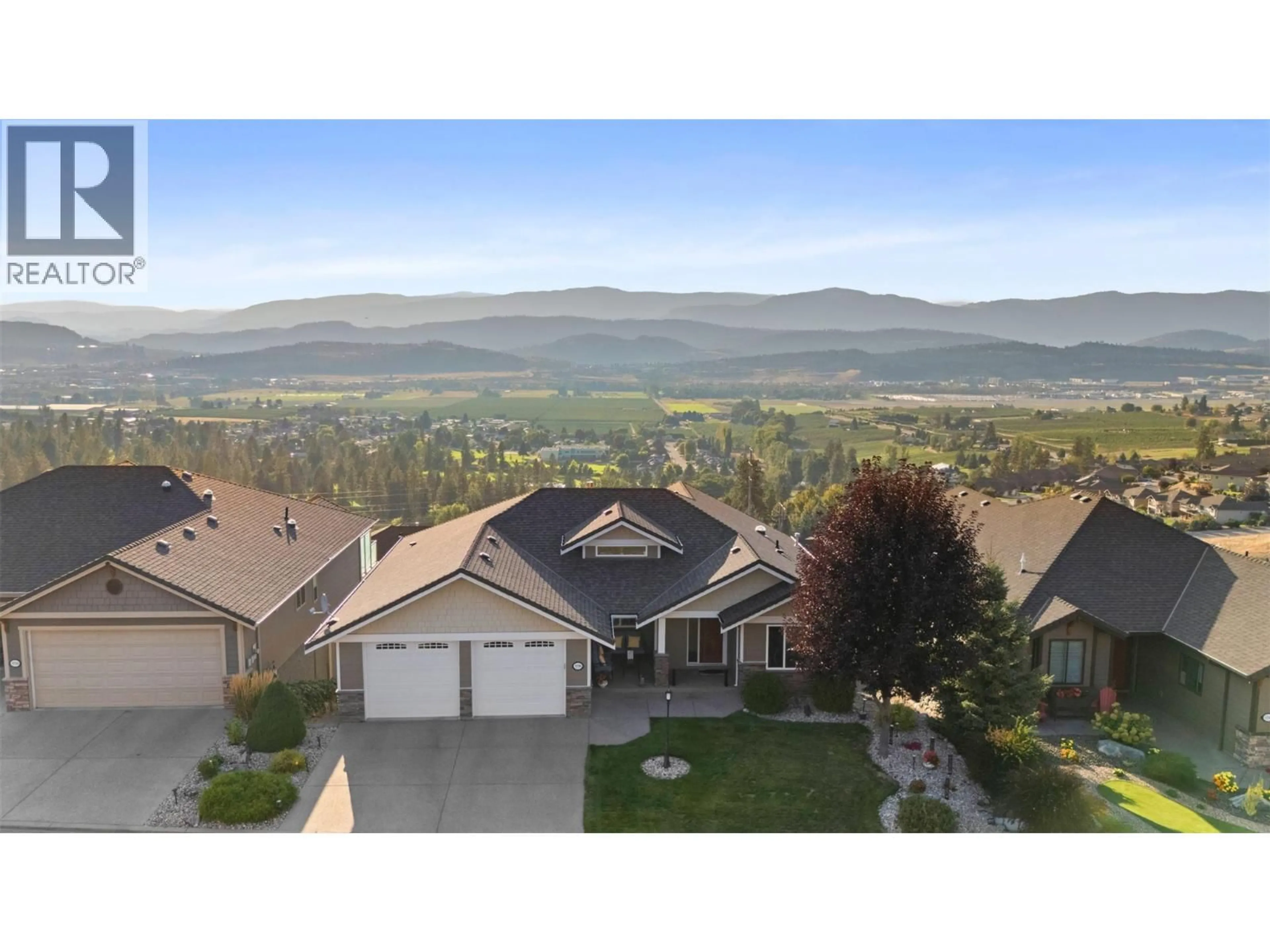 A pic from outside/outdoor area/front of a property/back of a property/a pic from drone, mountain view for 3728 RIVIERA DRIVE, Kelowna British Columbia V1X8E4