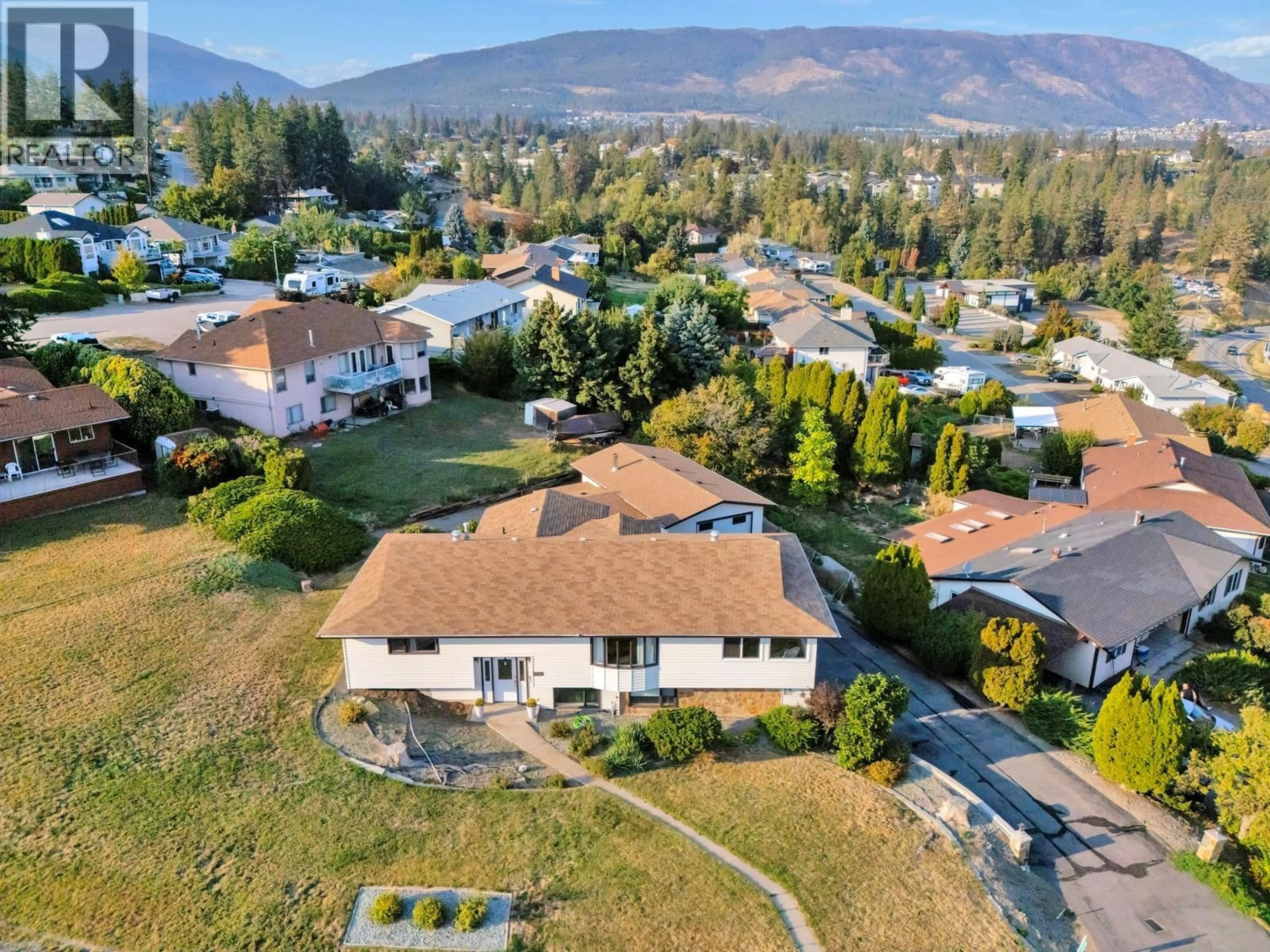 A pic from outside/outdoor area/front of a property/back of a property/a pic from drone, mountain view for 3795 SALLOUM ROAD, West Kelowna British Columbia V4T1E2