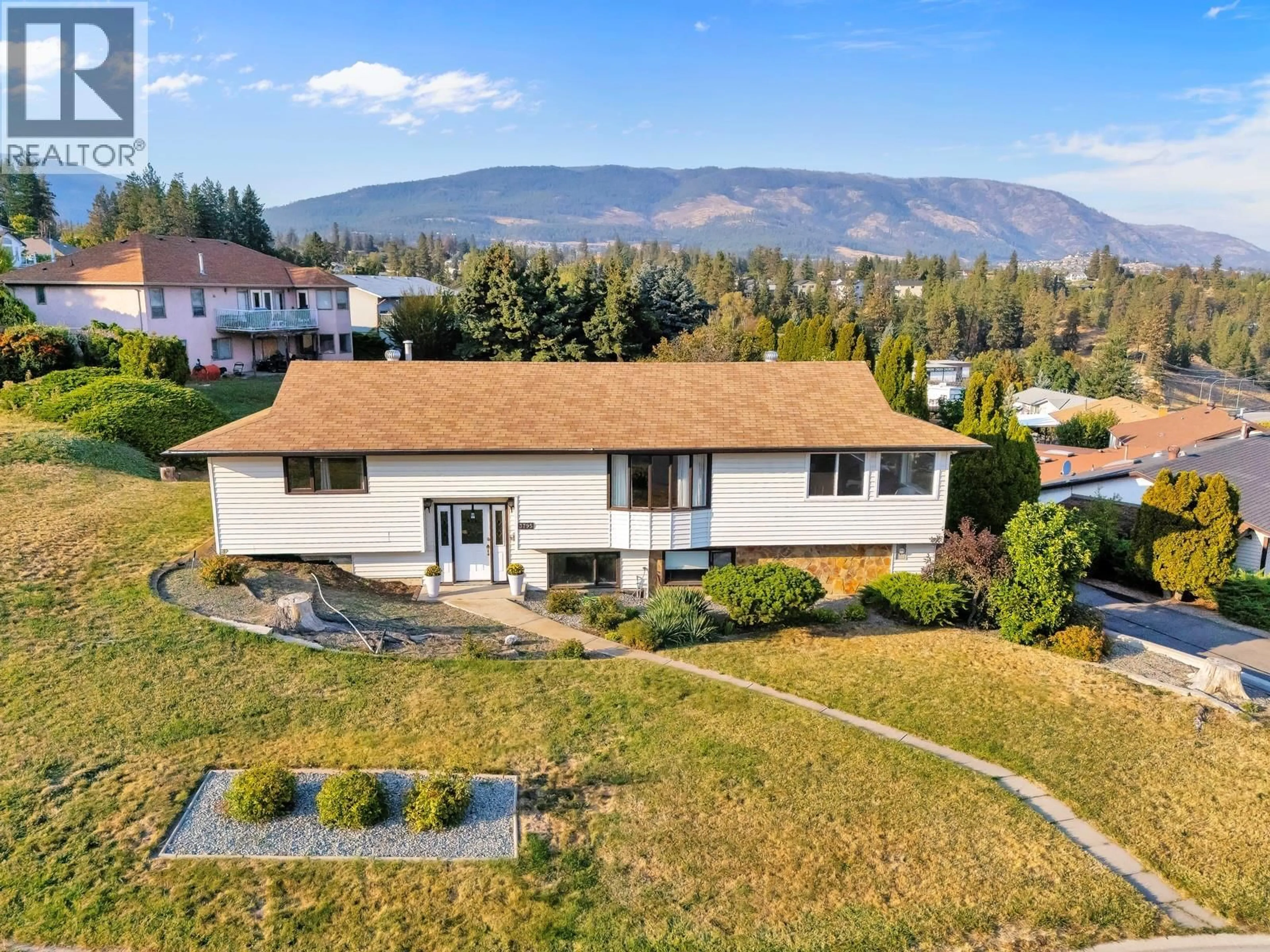 A pic from outside/outdoor area/front of a property/back of a property/a pic from drone, mountain view for 3795 SALLOUM ROAD, West Kelowna British Columbia V4T1E2