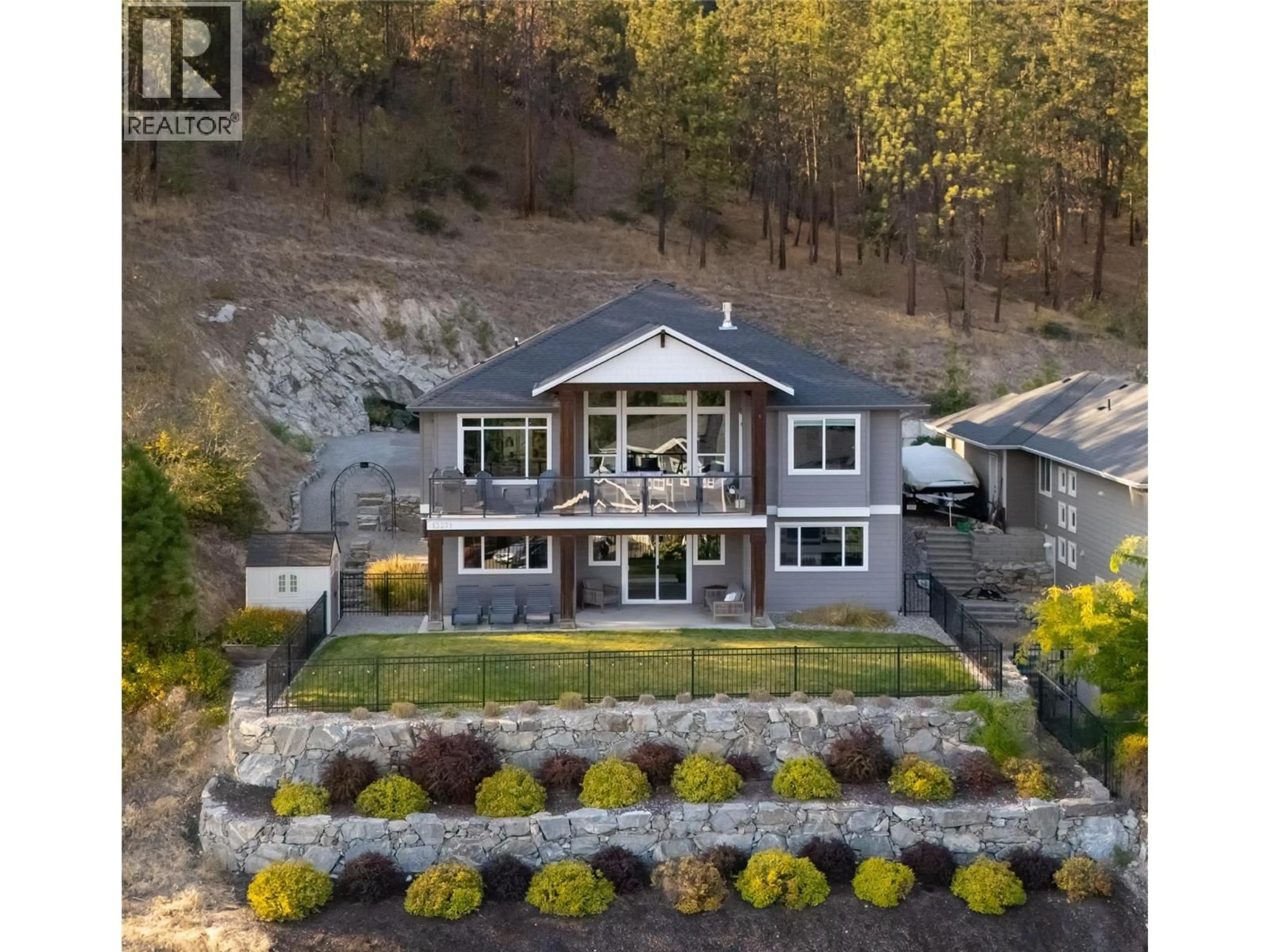 A pic from outside/outdoor area/front of a property/back of a property/a pic from drone, water/lake/river/ocean view for 13271 APEX LANE, Lake Country British Columbia V4V2W3