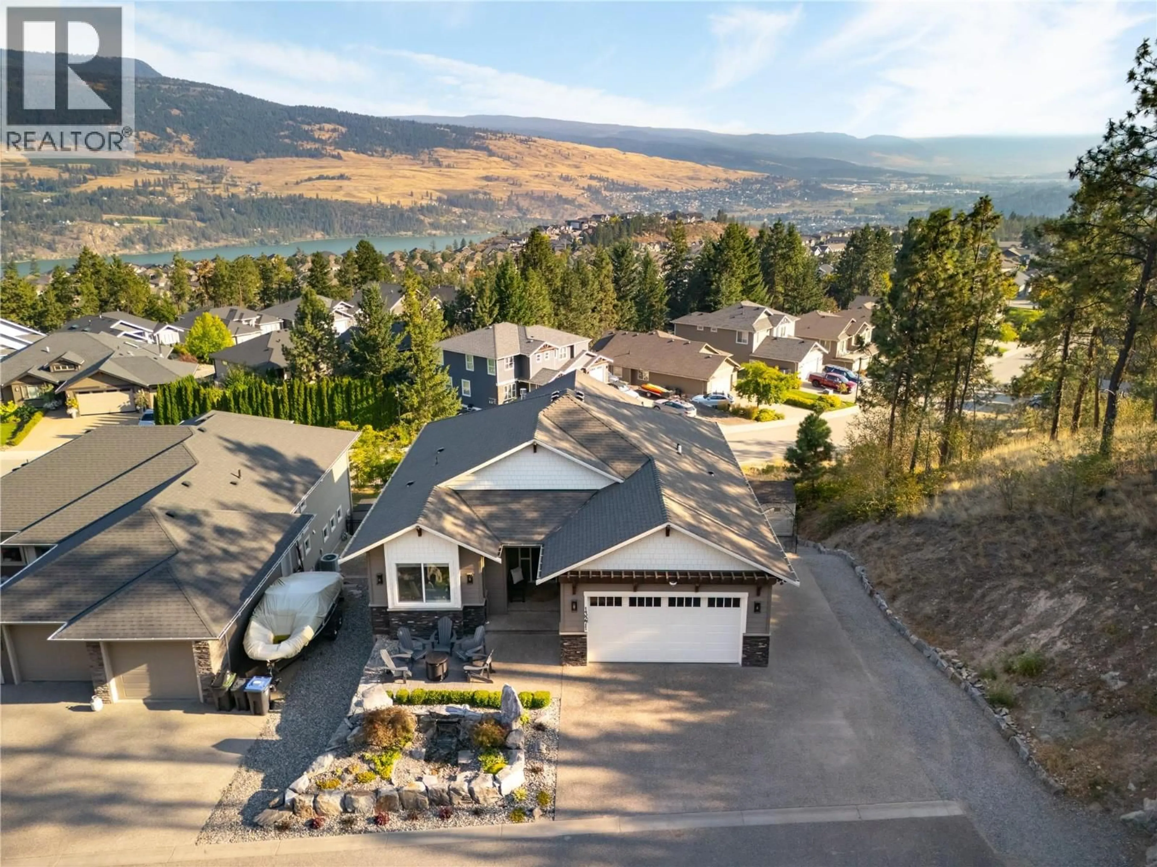 A pic from outside/outdoor area/front of a property/back of a property/a pic from drone, mountain view for 13271 APEX LANE, Lake Country British Columbia V4V2W3