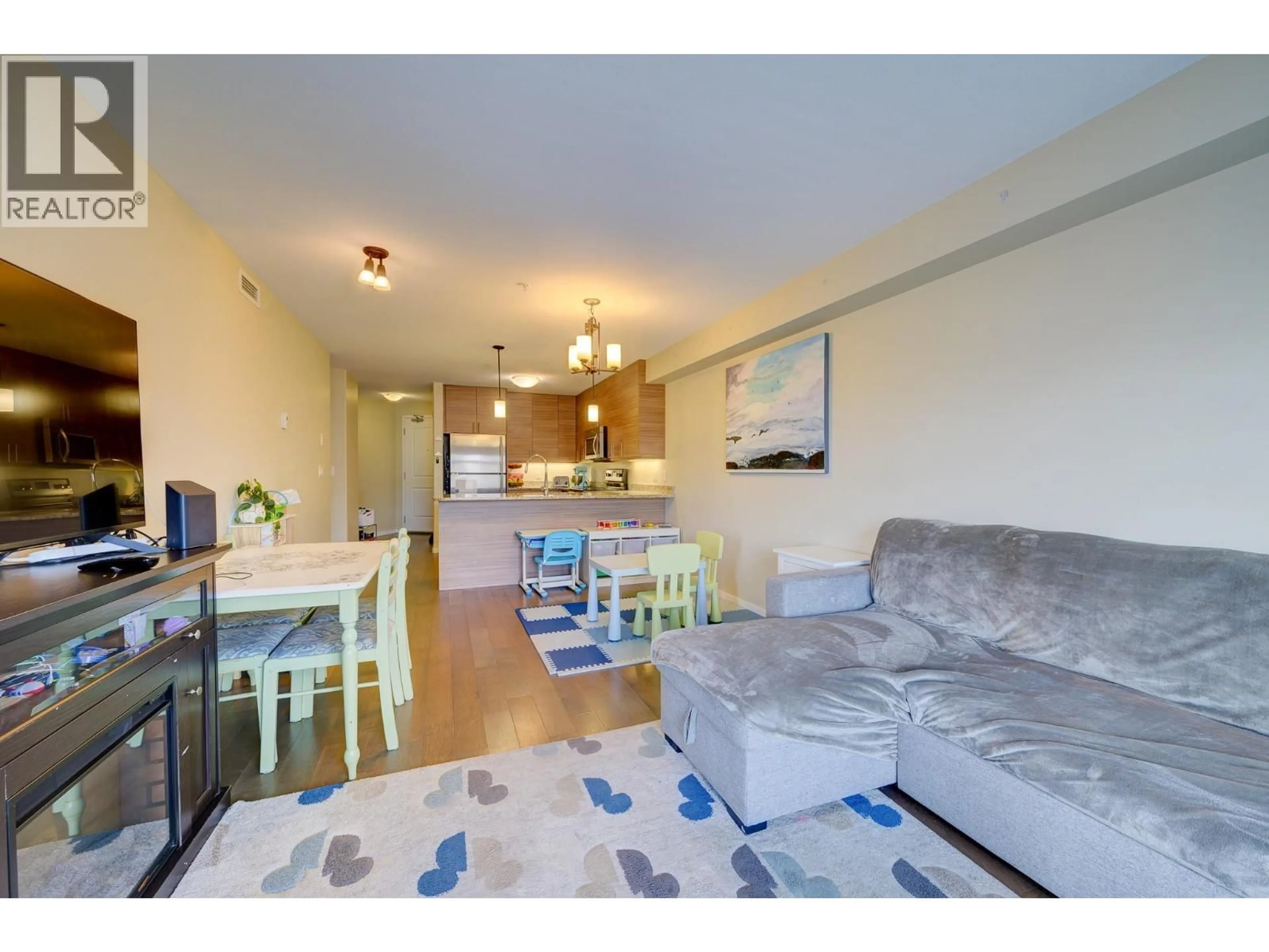 Living room with furniture, wood/laminate floor for 324 - 689 TRANQUILLE ROAD, Kamloops British Columbia V2B0C7
