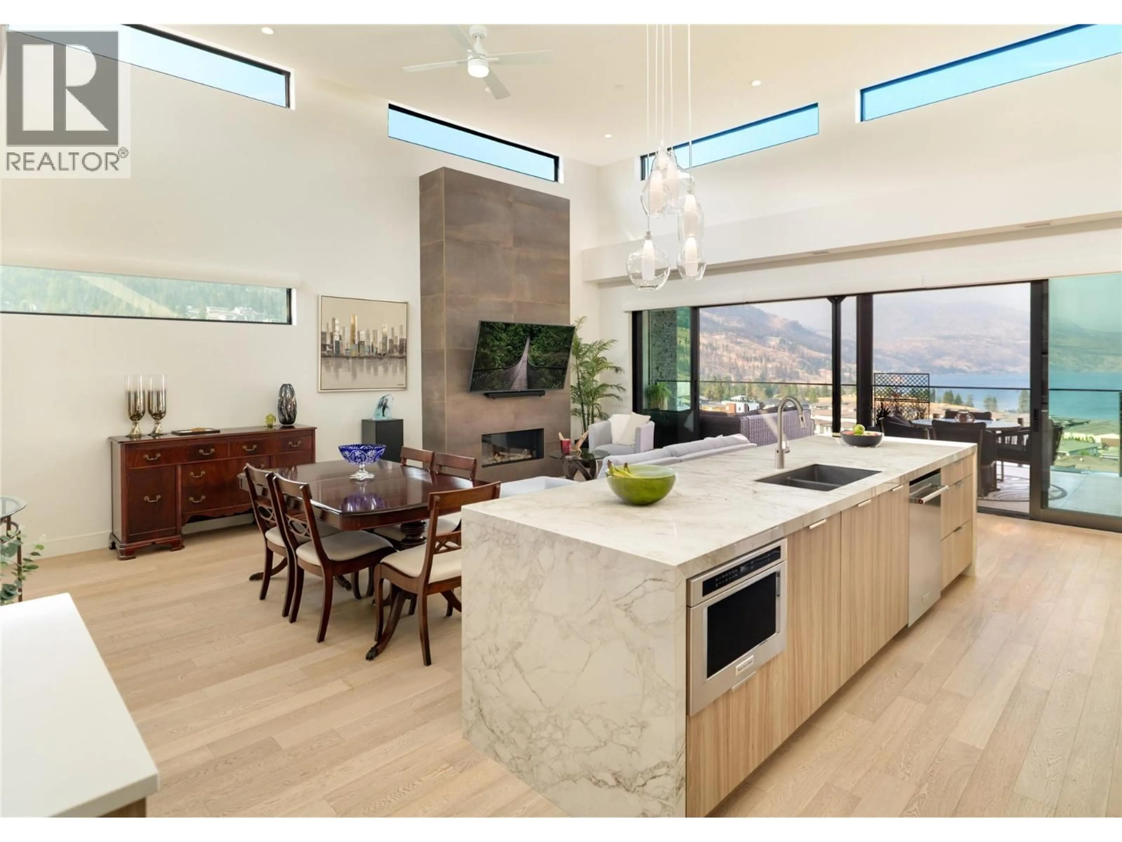 Open concept kitchen, ceramic/tile floor for 3501 - 3000 ARIVA DRIVE, Kelowna British Columbia V1Z0B3