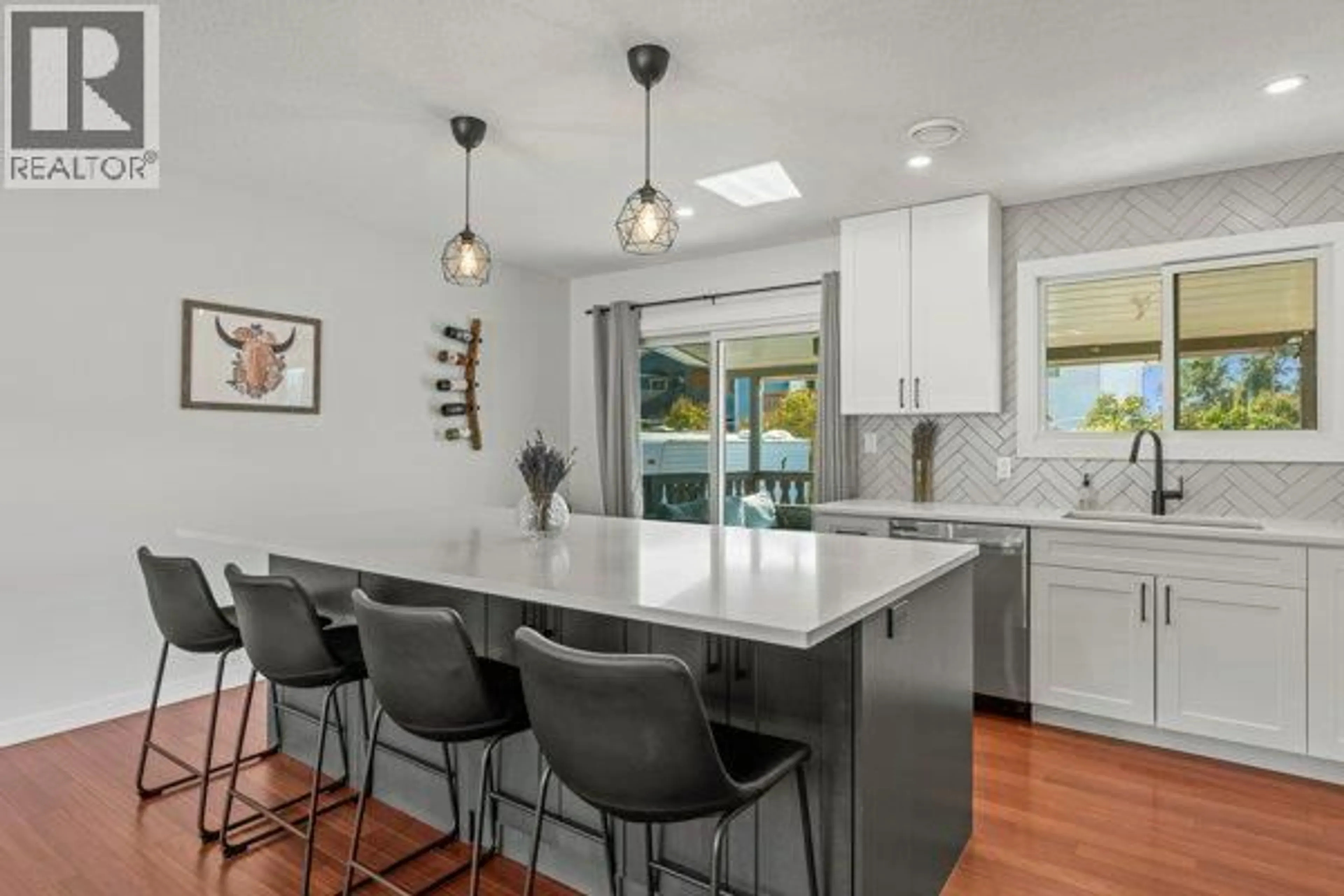 Open concept kitchen, ceramic/tile floor for 4500 17 STREET, Vernon British Columbia V1T3Z3