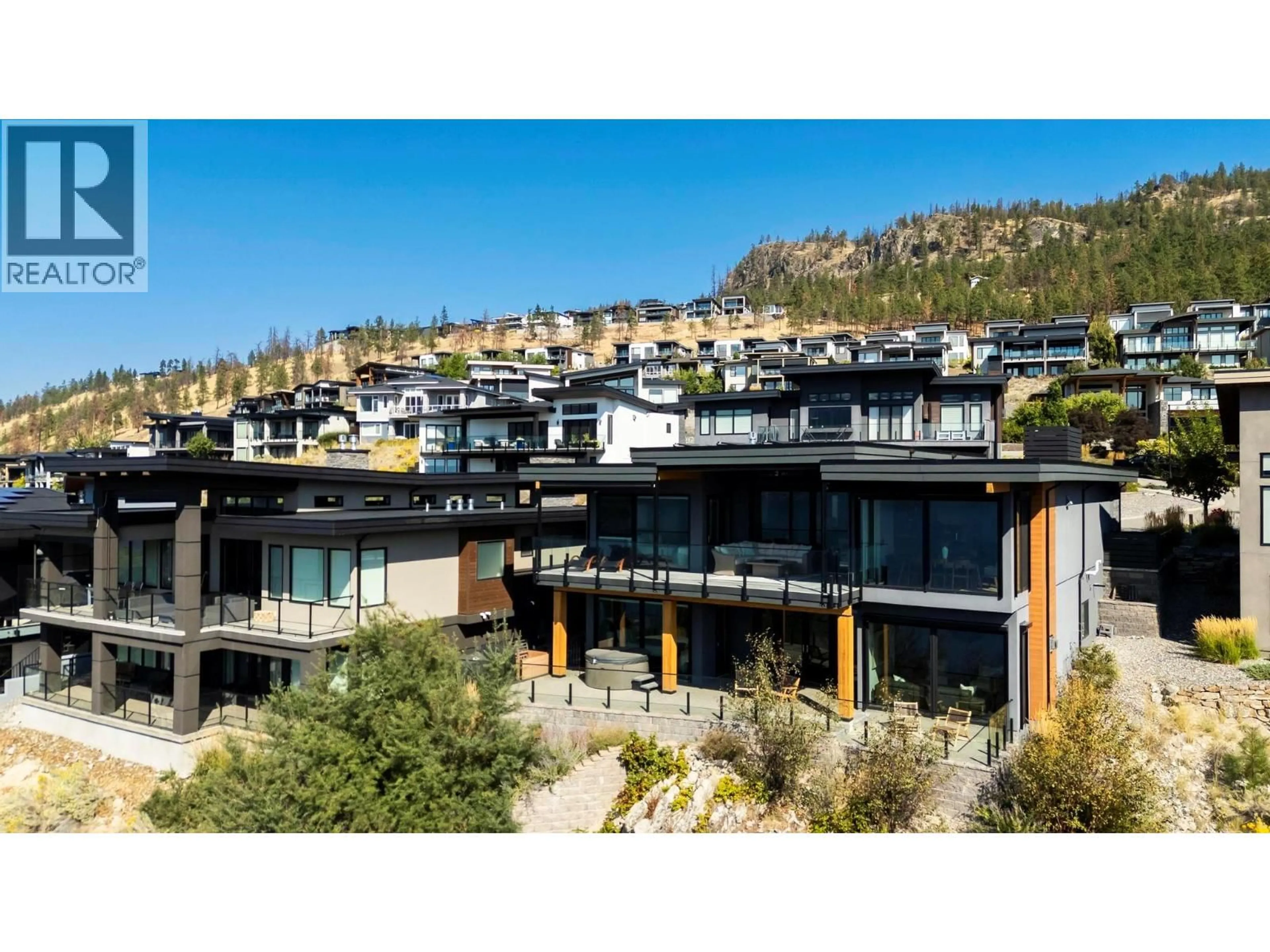 A pic from outside/outdoor area/front of a property/back of a property/a pic from drone, mountain view for 1502 MARBLE LEDGE DRIVE, Lake Country British Columbia V4V2T4