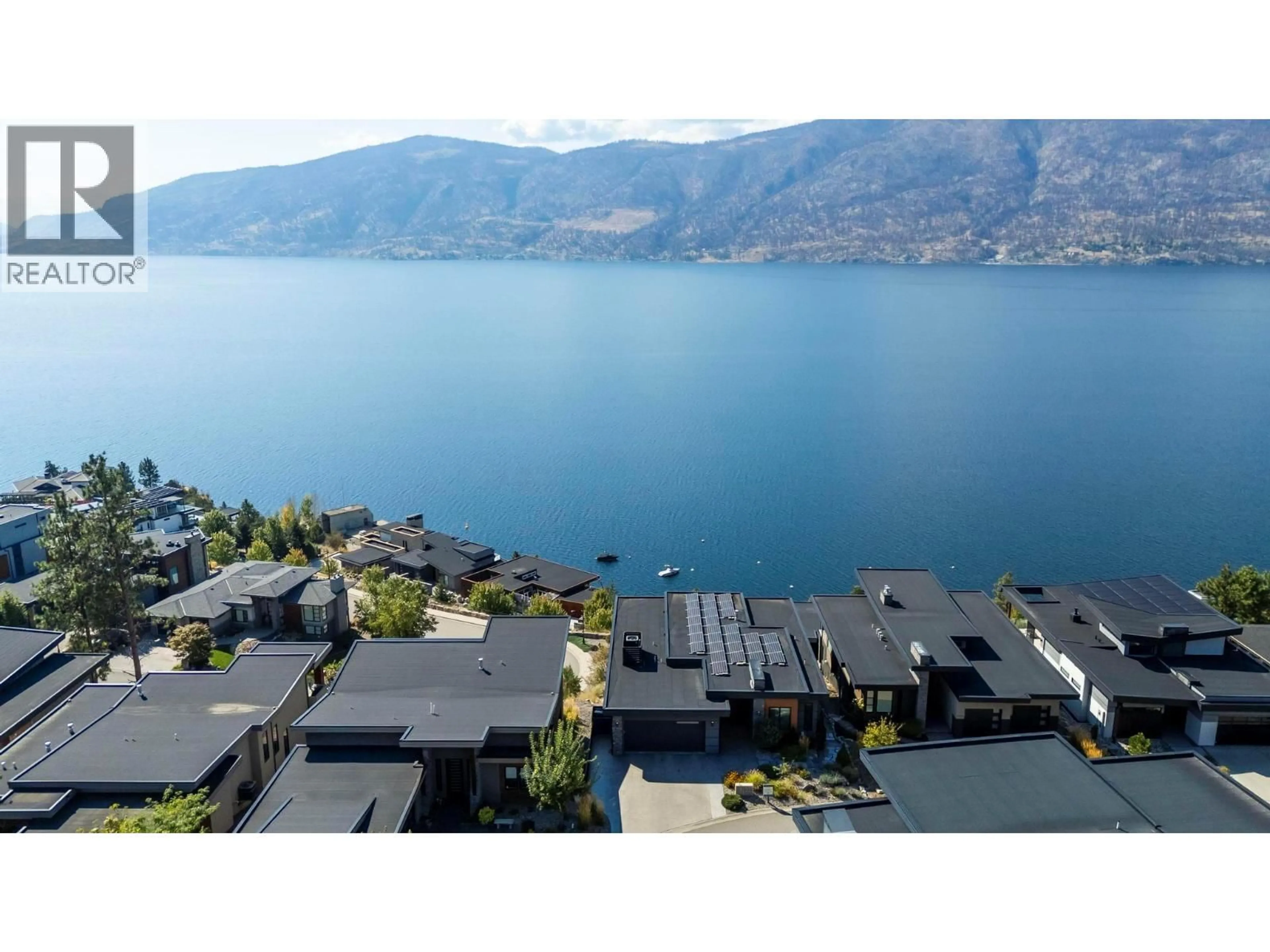 A pic from outside/outdoor area/front of a property/back of a property/a pic from drone, water/lake/river/ocean view for 1502 MARBLE LEDGE DRIVE, Lake Country British Columbia V4V2T4
