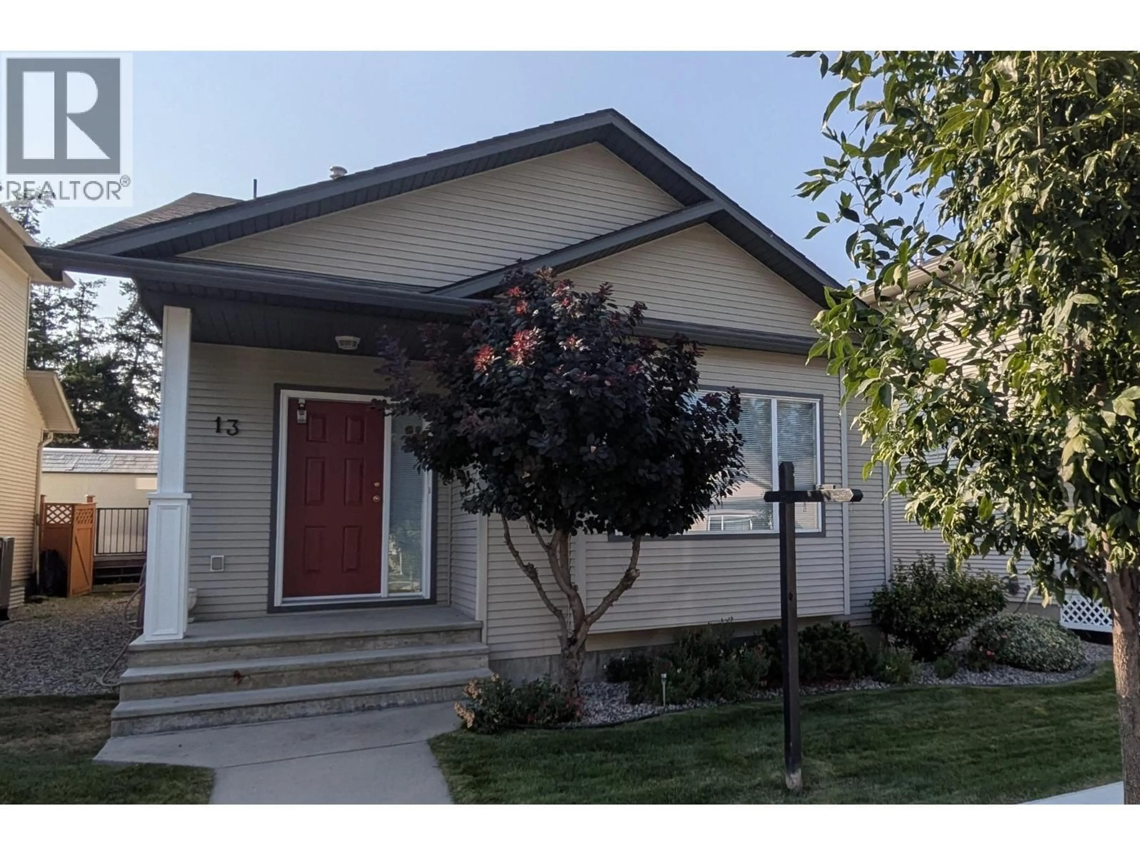 Home with vinyl exterior material, street for 13 - 2210 HORIZON DRIVE, West Kelowna British Columbia V1Z3L4