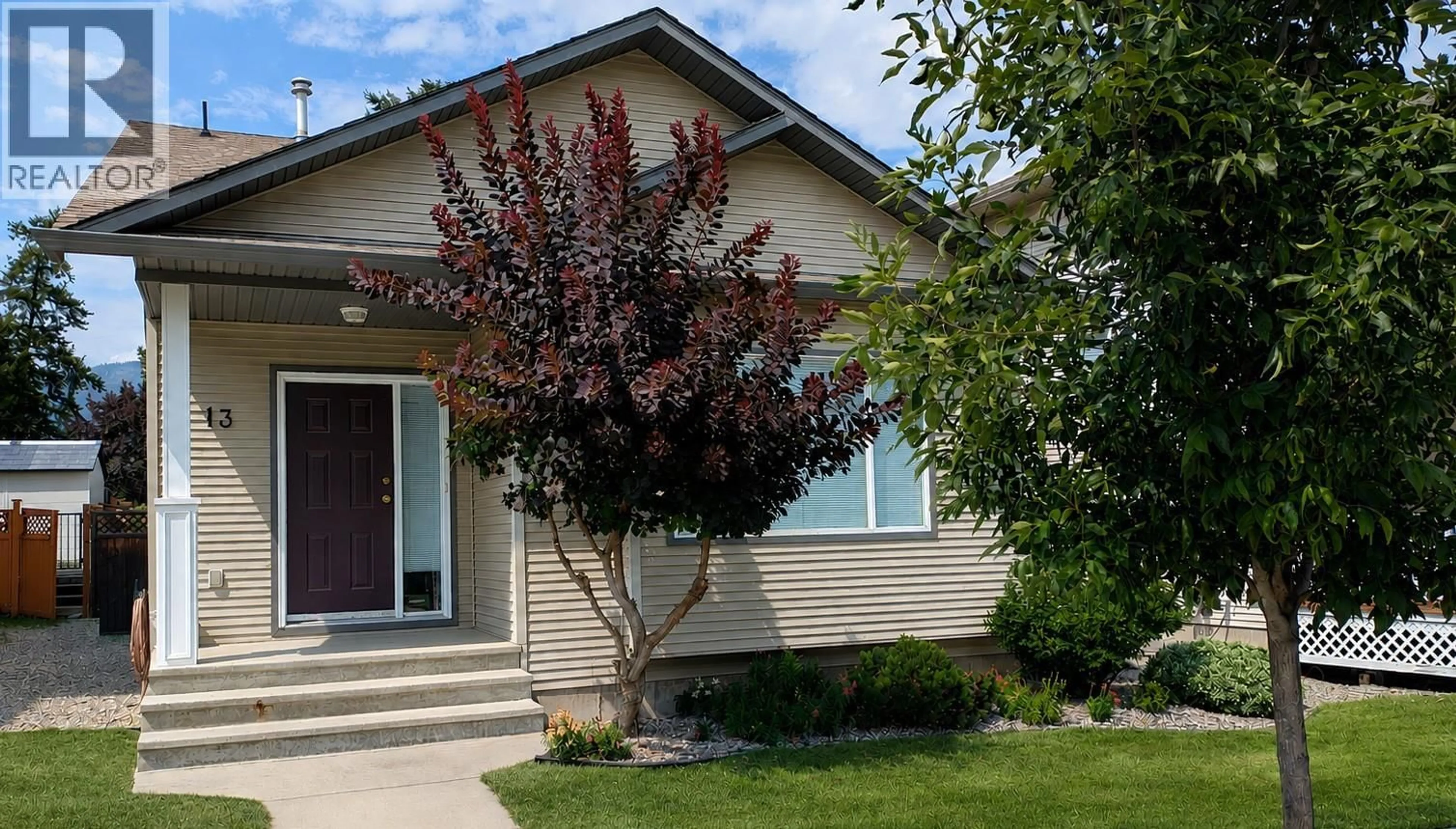 Home with vinyl exterior material, street for 13 - 2210 HORIZON DRIVE, West Kelowna British Columbia V1Z3L4