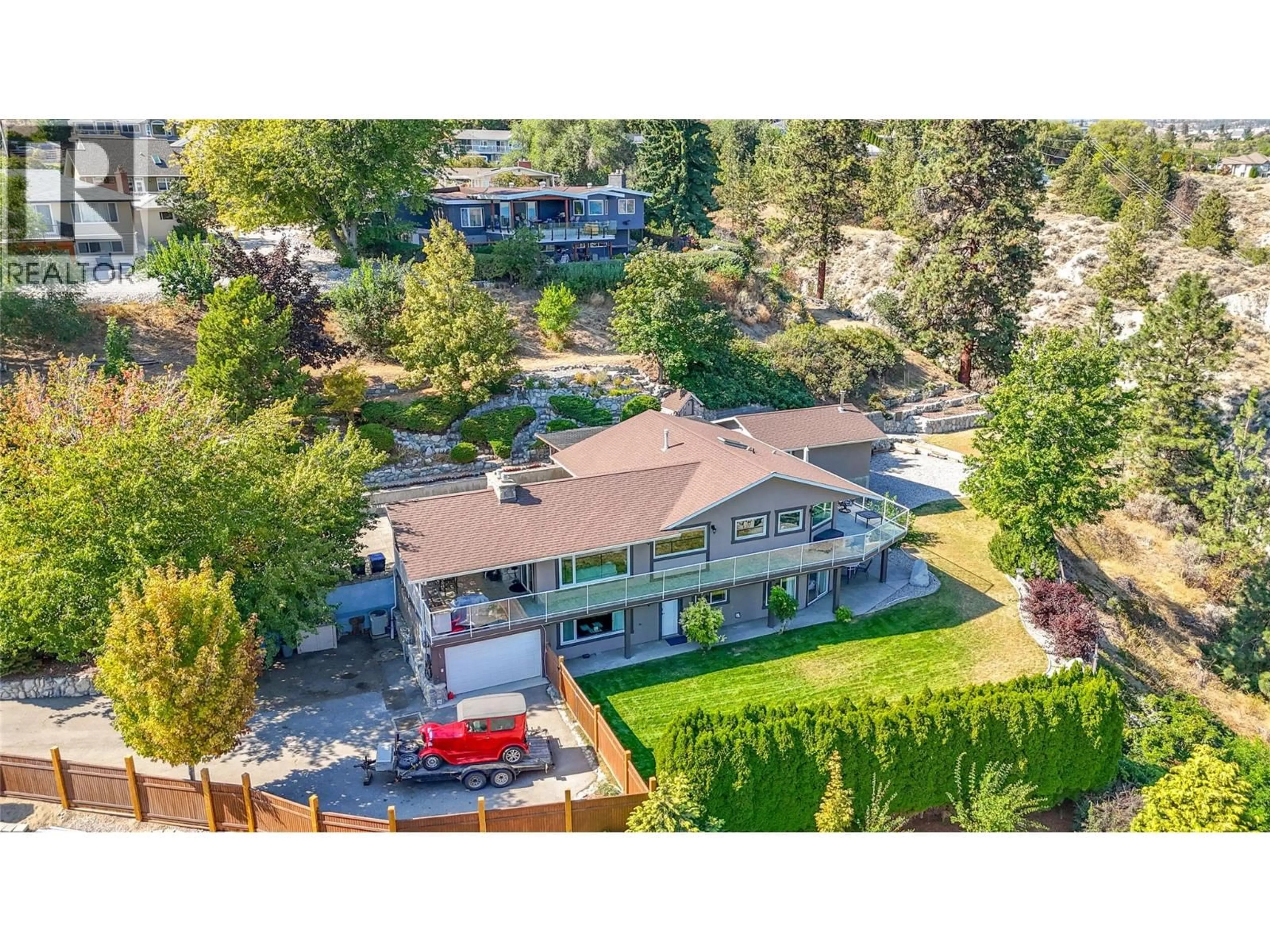 A pic from outside/outdoor area/front of a property/back of a property/a pic from drone, unknown for 6318 FAIRCREST STREET, Summerland British Columbia V0H1Z1