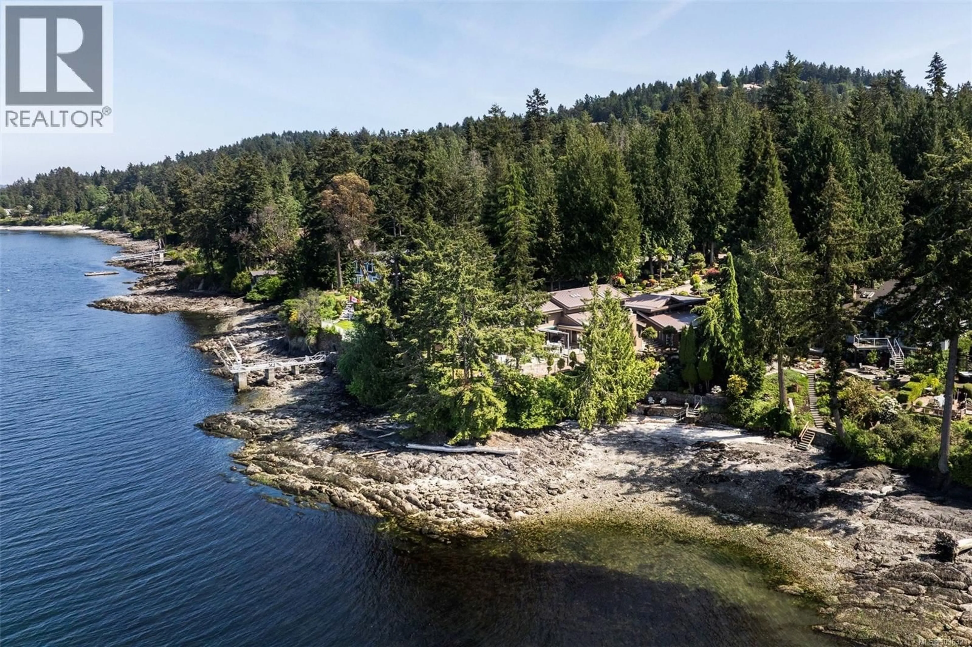 A pic from outside/outdoor area/front of a property/back of a property/a pic from drone, water/lake/river/ocean view for 960 LANDS END END, North Saanich British Columbia V8L5L3