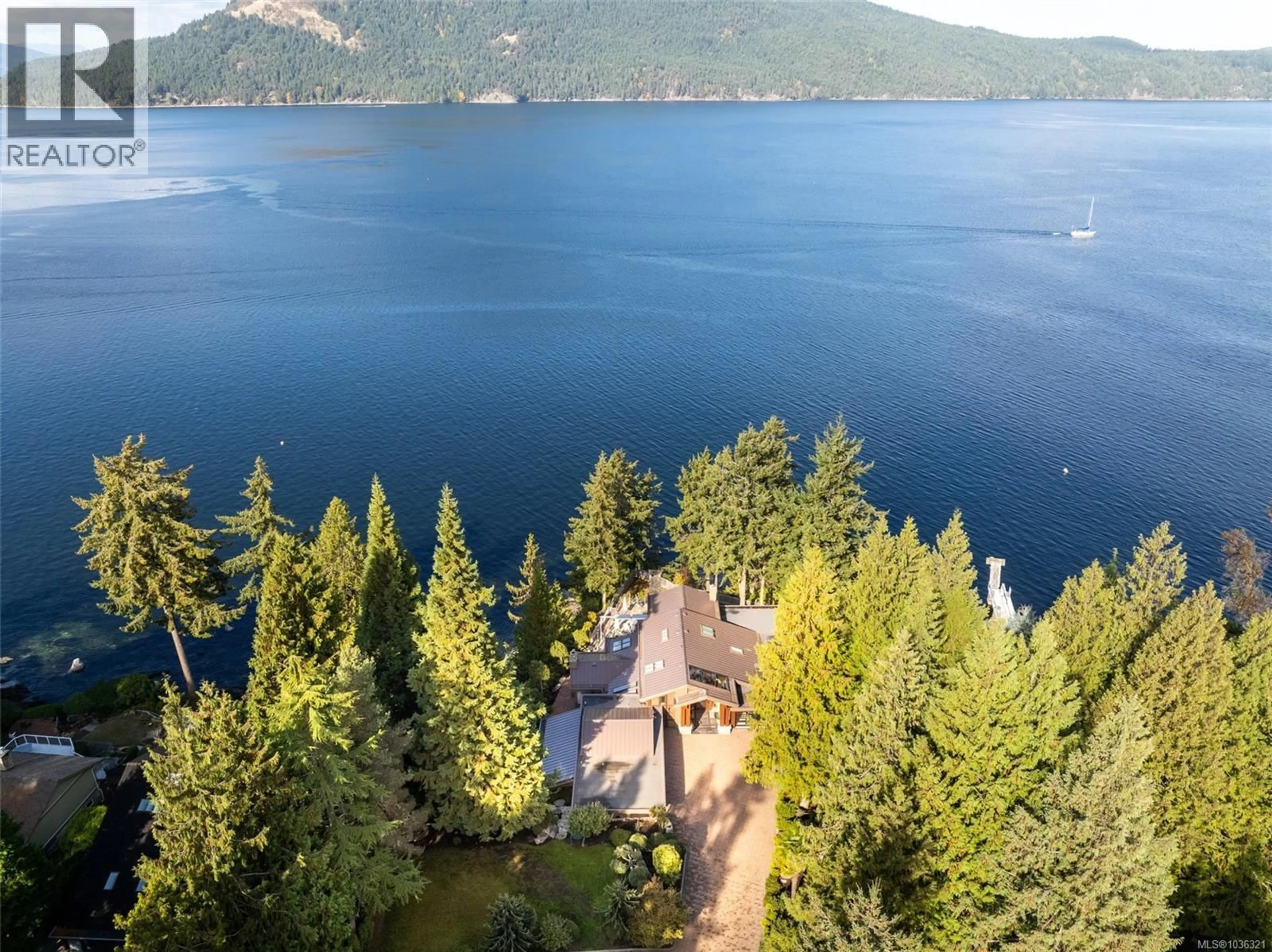 A pic from outside/outdoor area/front of a property/back of a property/a pic from drone, water/lake/river/ocean view for 960 LANDS END END, North Saanich British Columbia V8L5L3