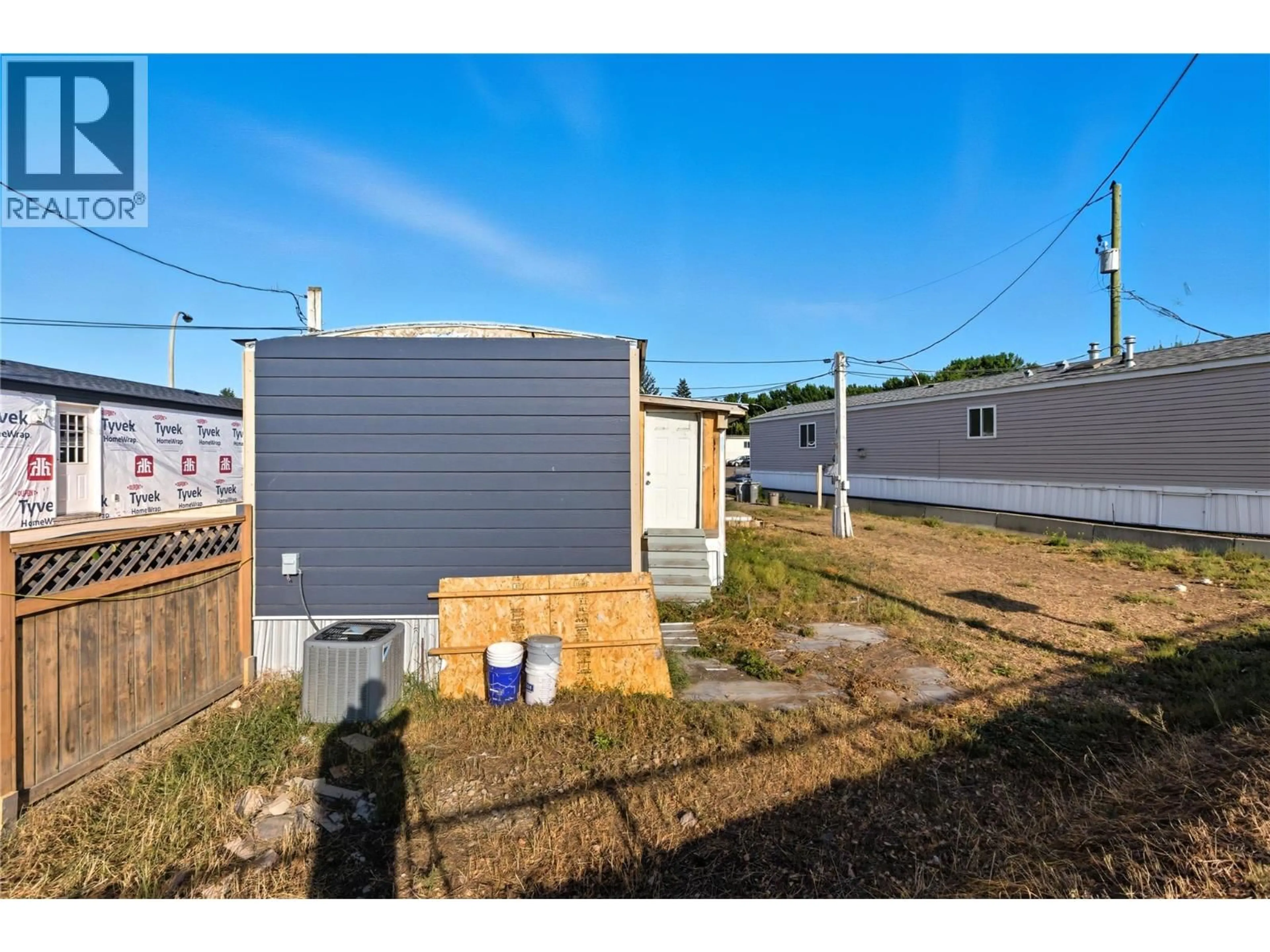 A pic from outside/outdoor area/front of a property/back of a property/a pic from drone, street for 3P - 3 PLUTO DRIVE, Kamloops British Columbia V2B1A6