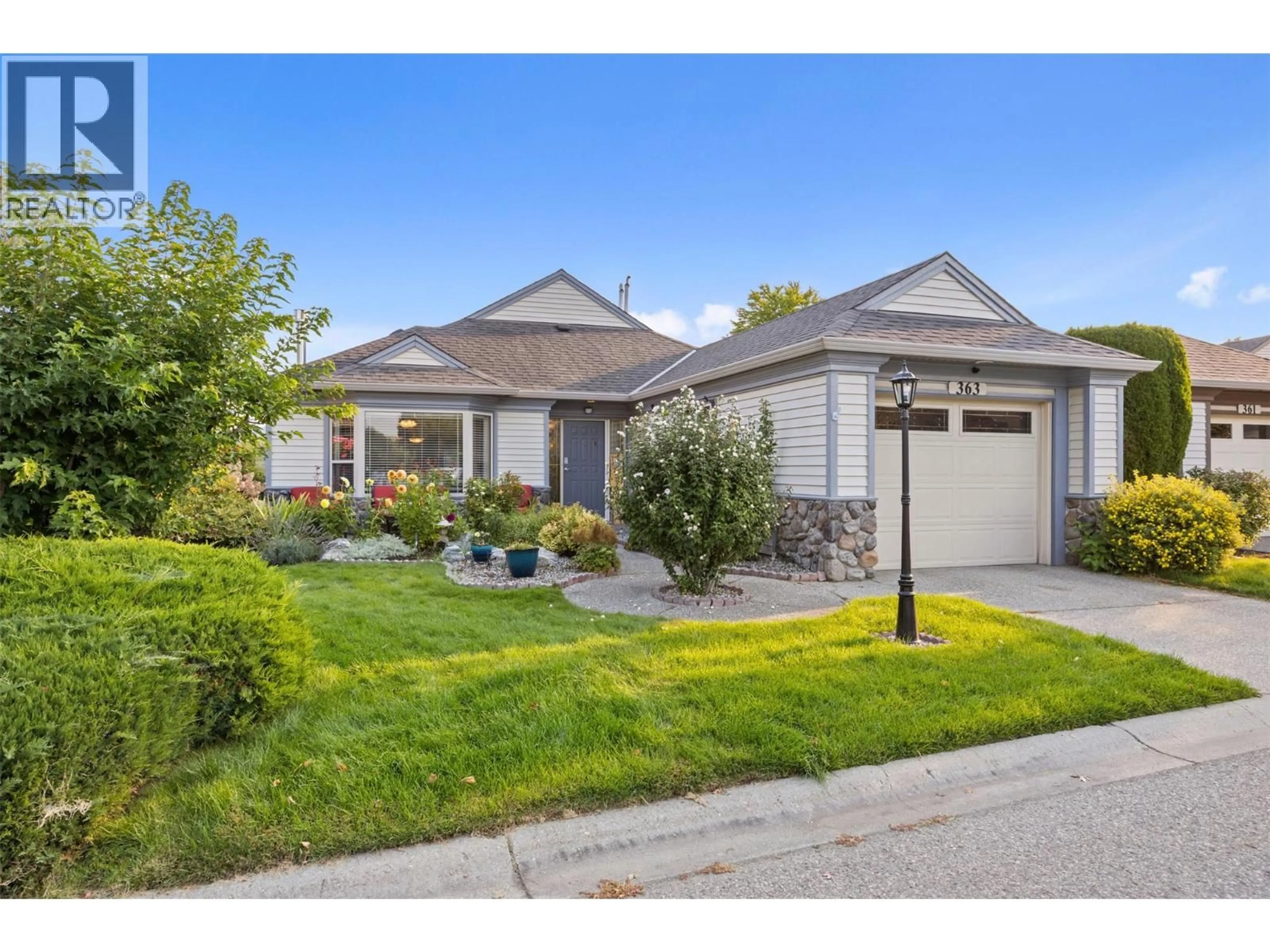 Home with vinyl exterior material, street for 363 - 550 YATES ROAD, Kelowna British Columbia V1V1Z4