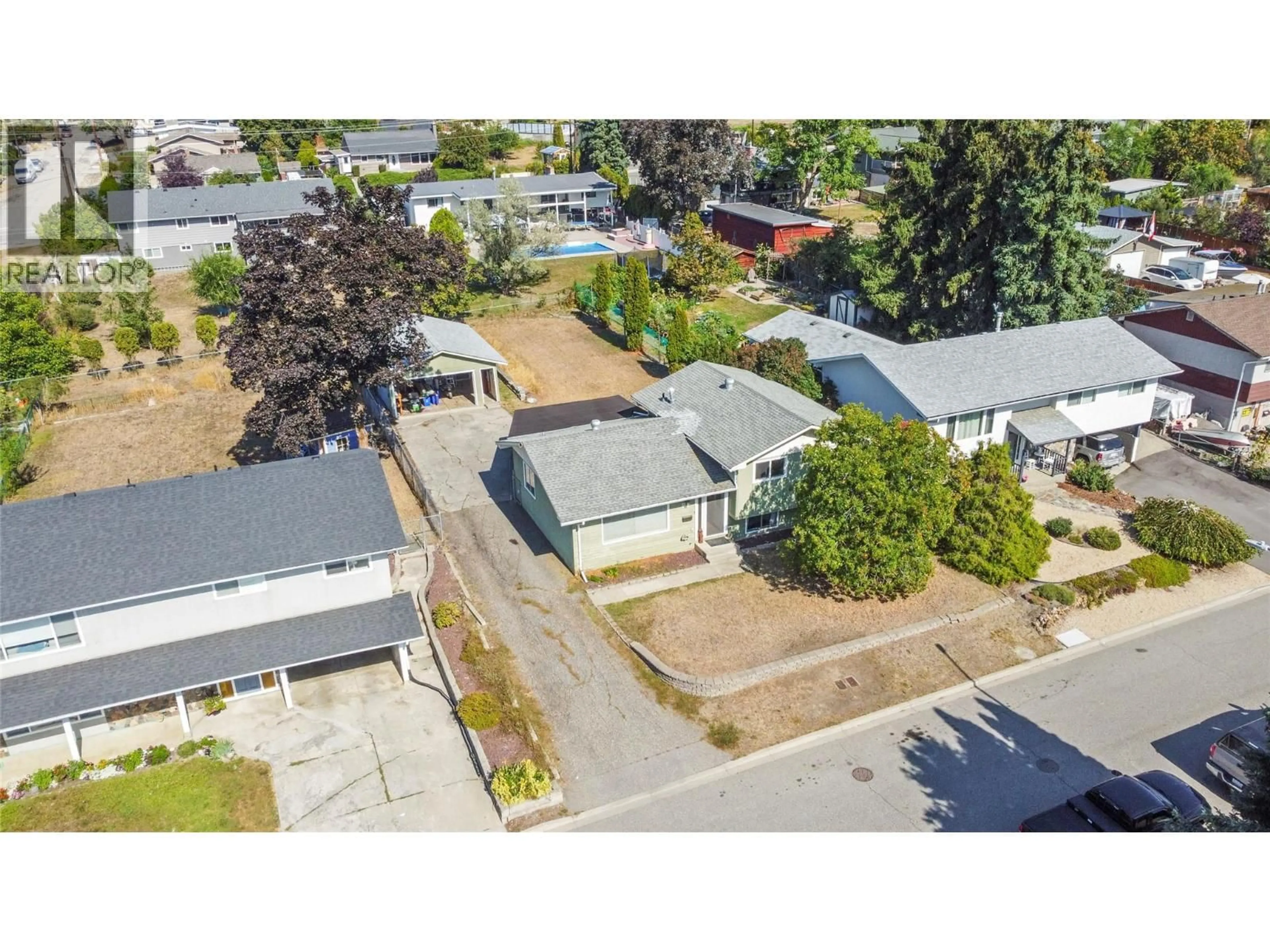 A pic from outside/outdoor area/front of a property/back of a property/a pic from drone, street for 2107 24 AVENUE, Vernon British Columbia V1T1L1