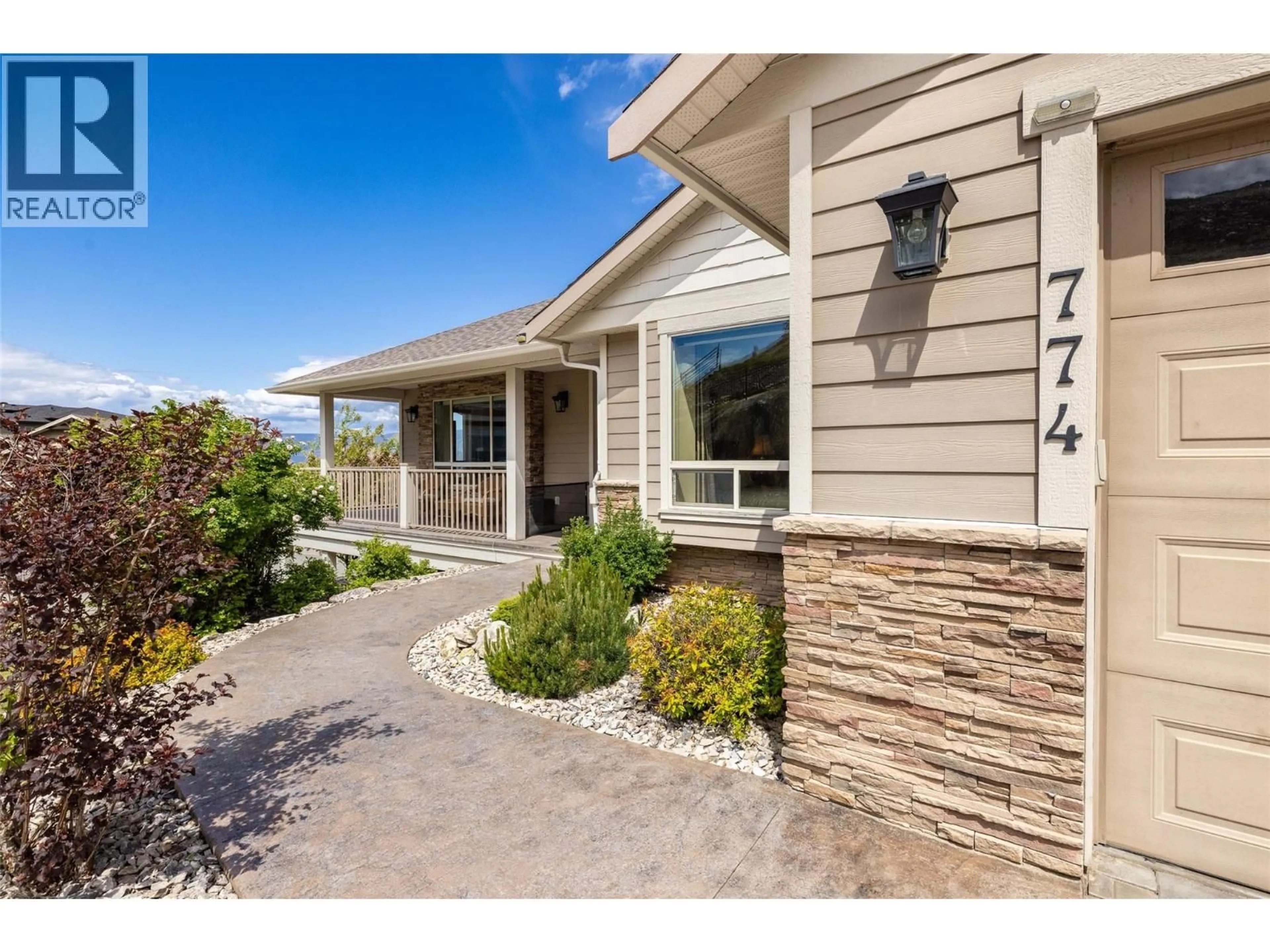 Home with vinyl exterior material, street for 774 KUIPERS CRESCENT, Kelowna British Columbia V1W5C9