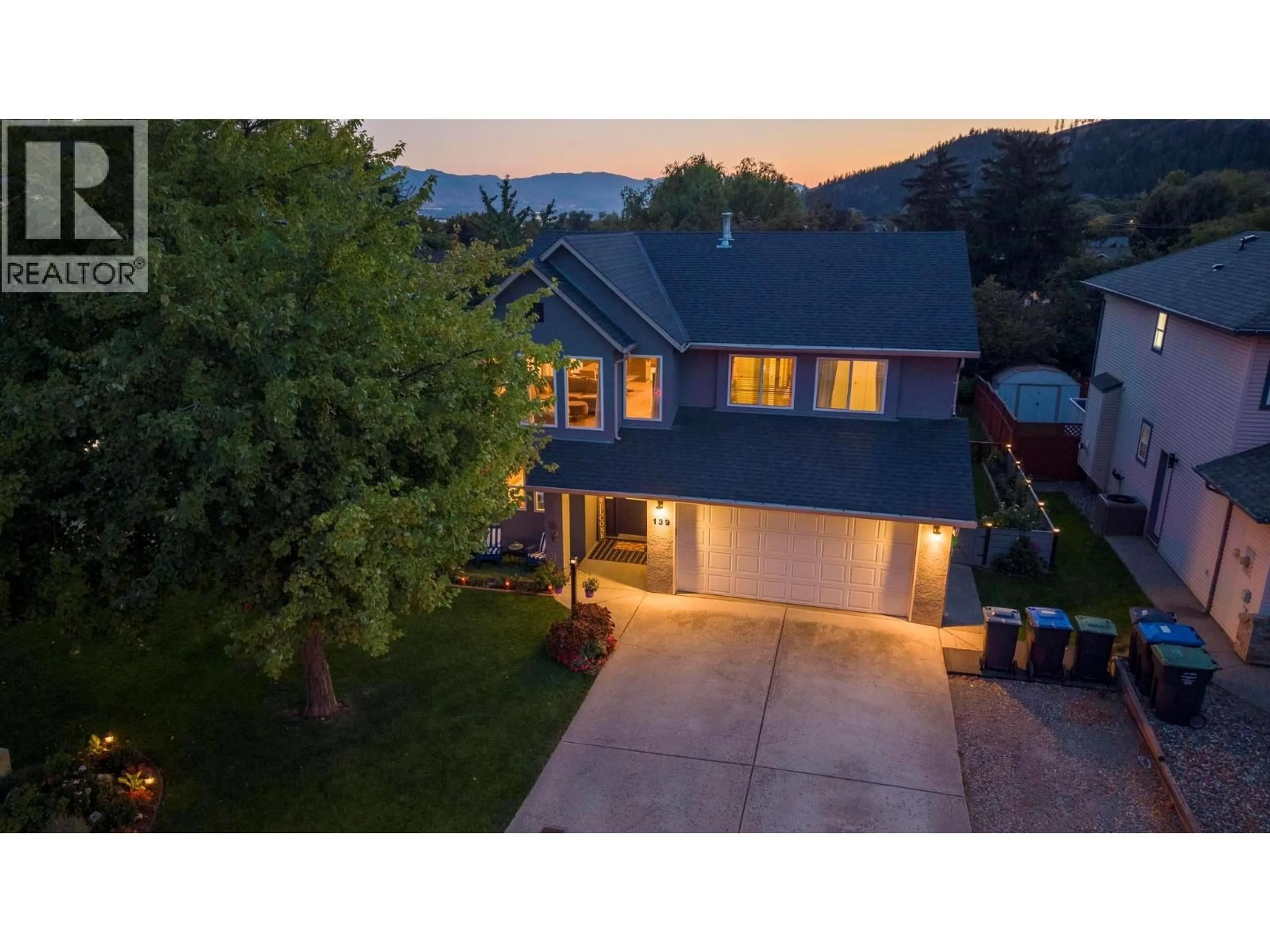 A pic from outside/outdoor area/front of a property/back of a property/a pic from drone, street for 139 WYNDHAM CRESCENT, Kelowna British Columbia V1V1Z2