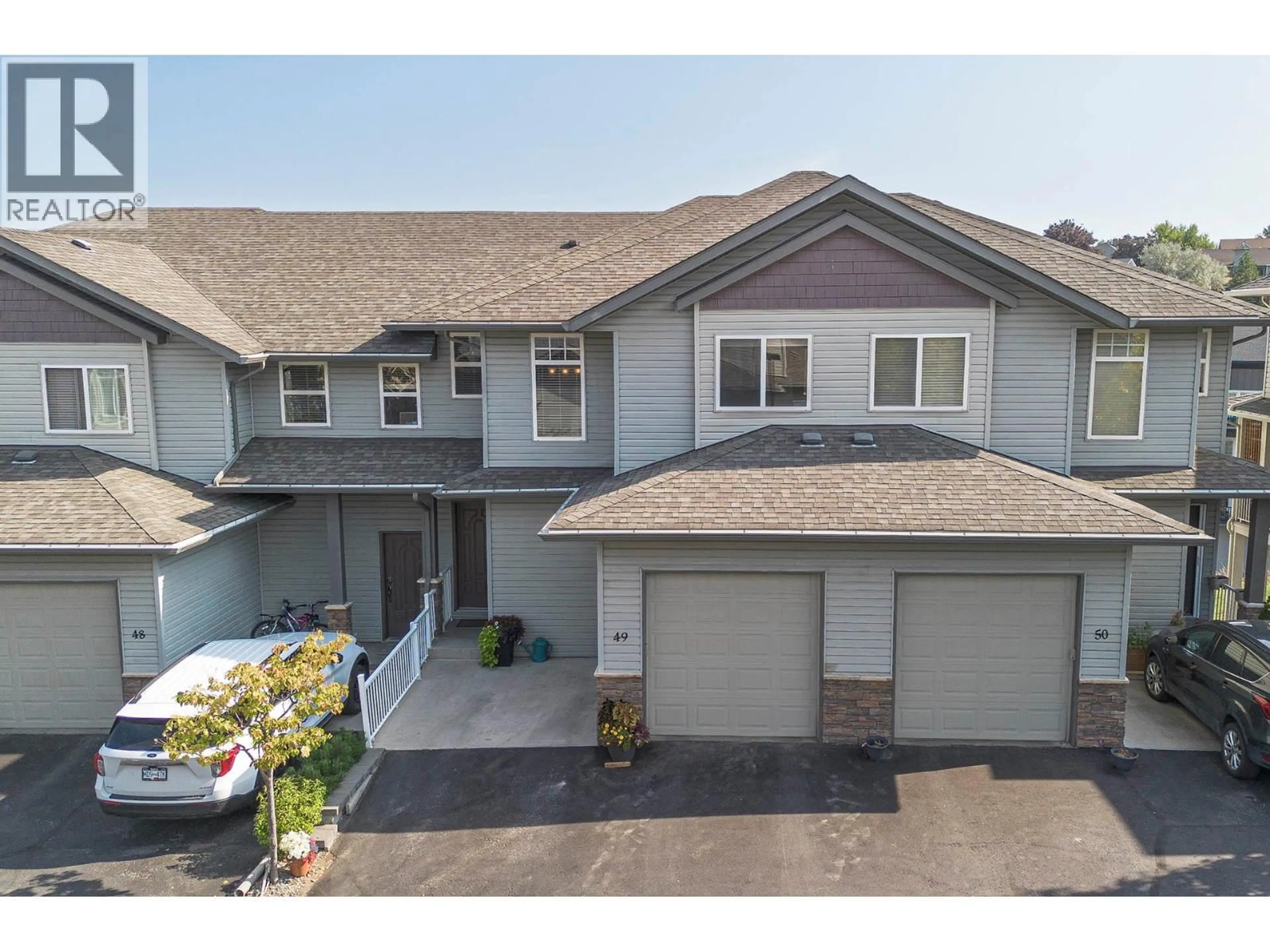 A pic from outside/outdoor area/front of a property/back of a property/a pic from drone, street for 49 - 2046 ROBSON PLACE, Kamloops British Columbia V2E0A5