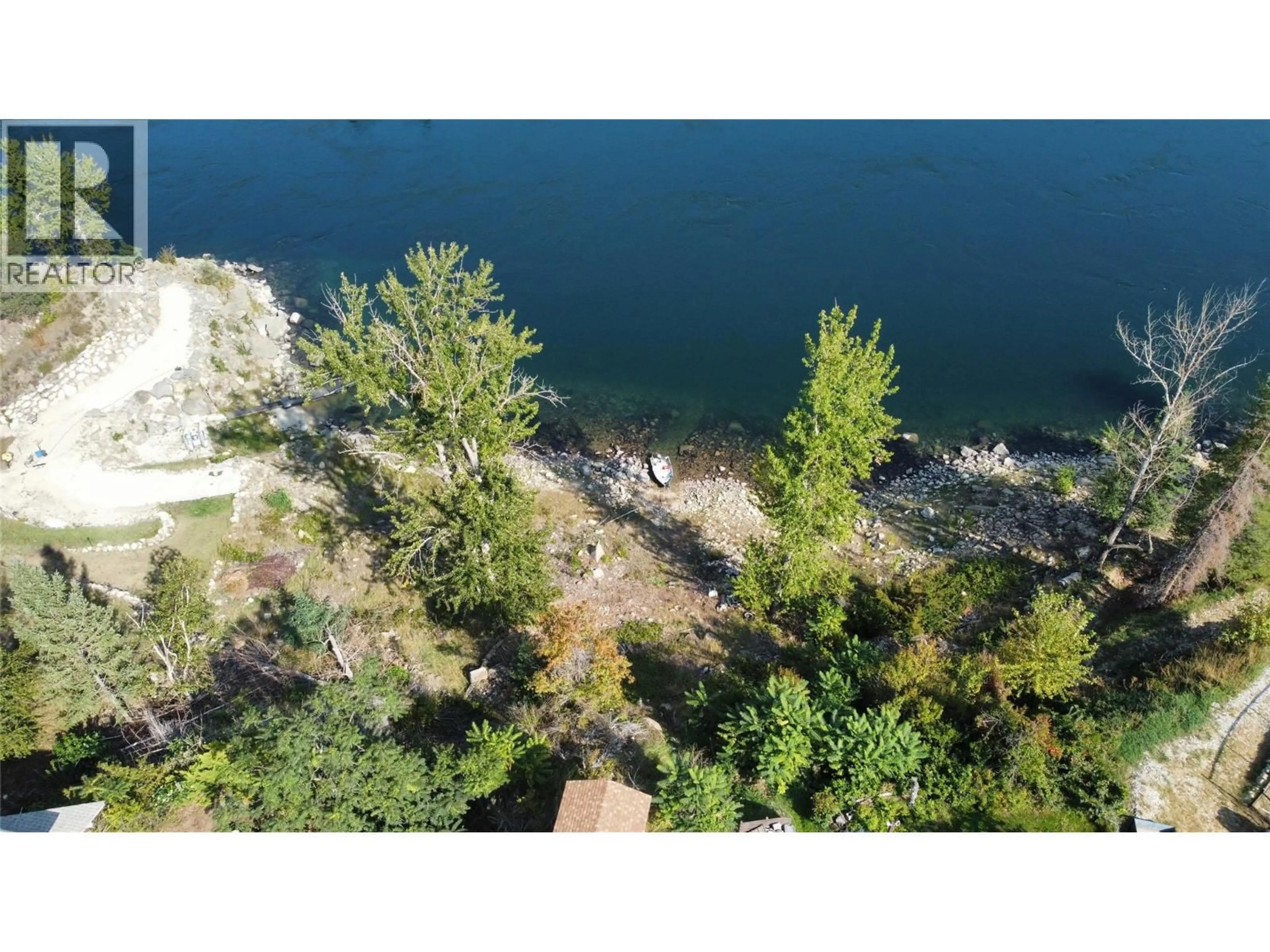 A pic from outside/outdoor area/front of a property/back of a property/a pic from drone, water/lake/river/ocean view for 221 2ND AVENUE, Rivervale British Columbia V1R4V2