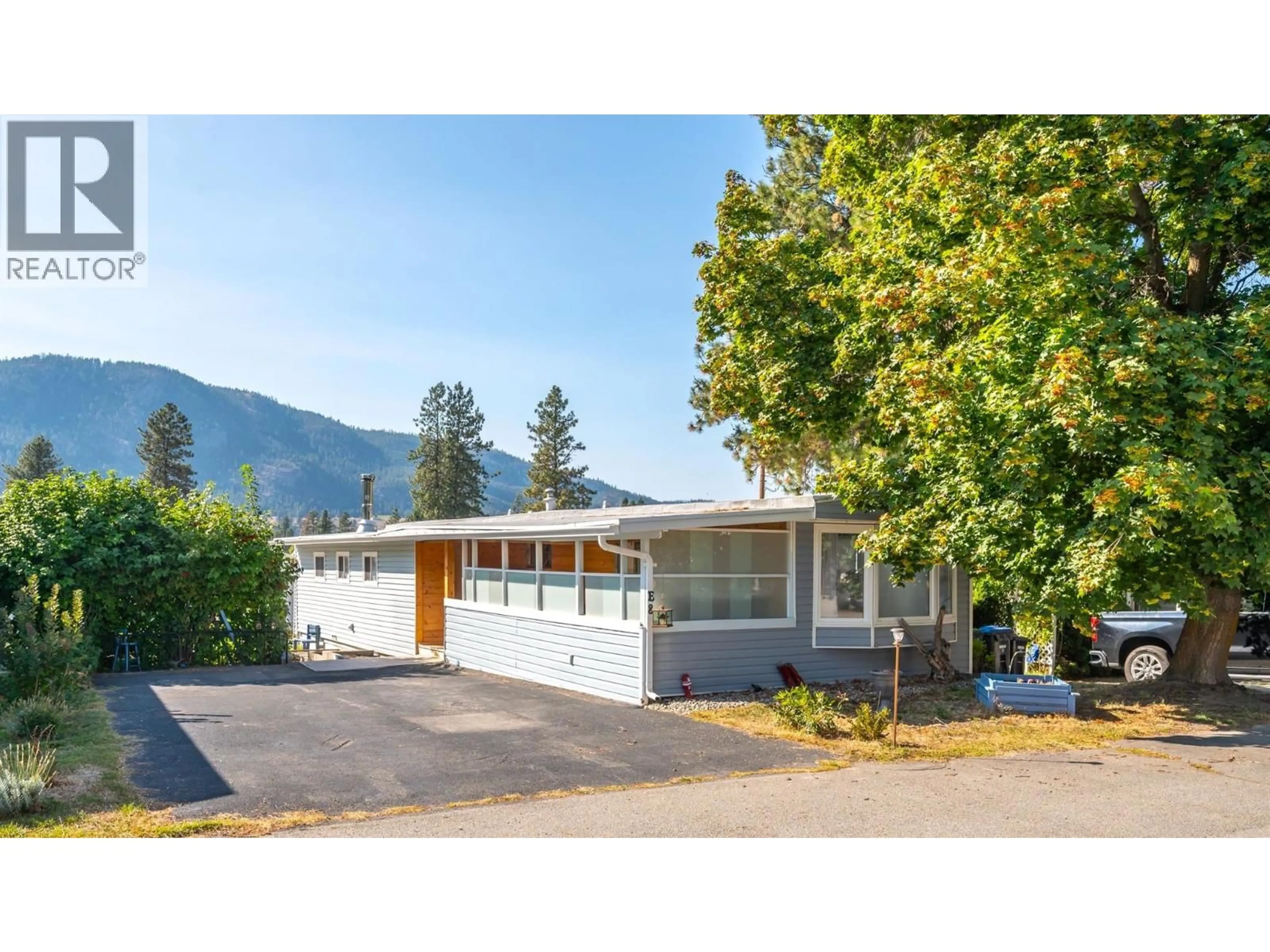 Home with vinyl exterior material, mountain view for E8 - 4505 MCLEAN CREEK ROAD, Okanagan Falls British Columbia V0H1R1
