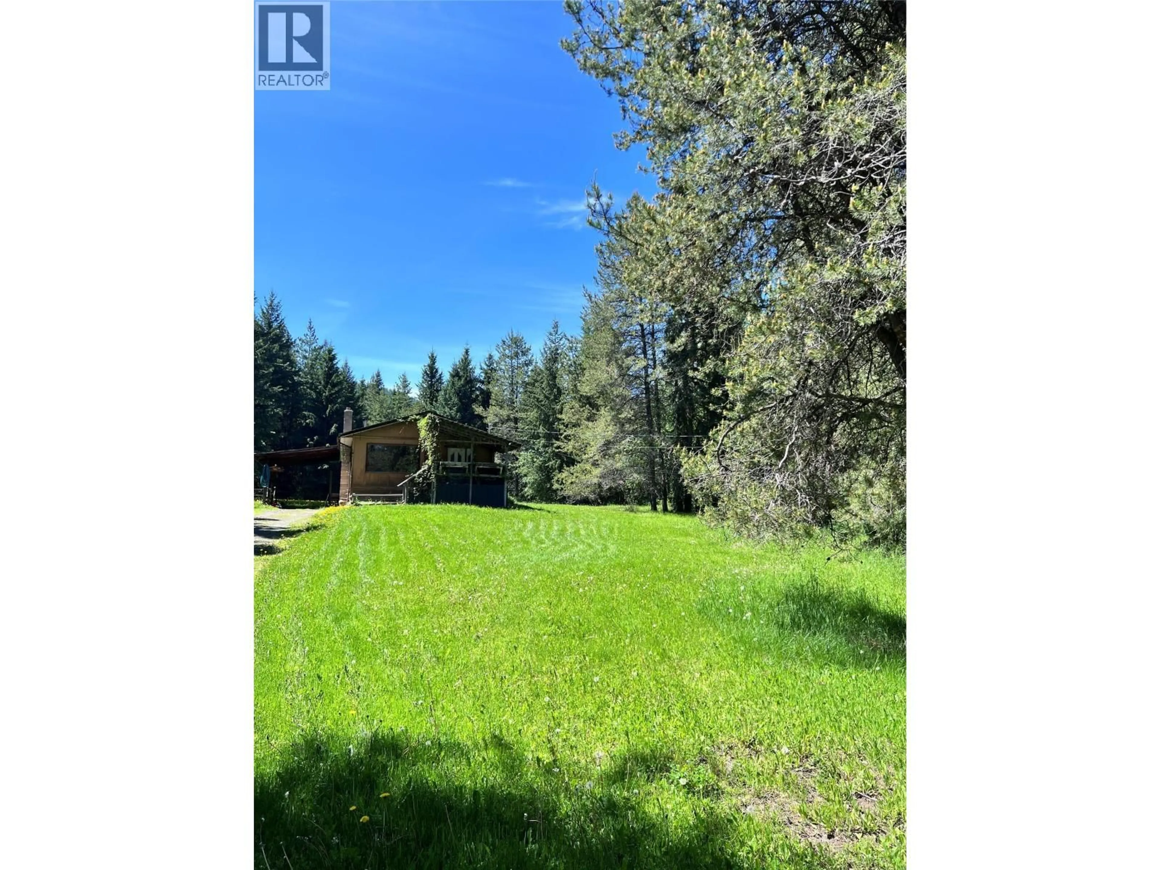 A pic from outside/outdoor area/front of a property/back of a property/a pic from drone, forest/trees view for 44 HOLLINGSWORTH ROAD, Cherryville British Columbia V0E2G3