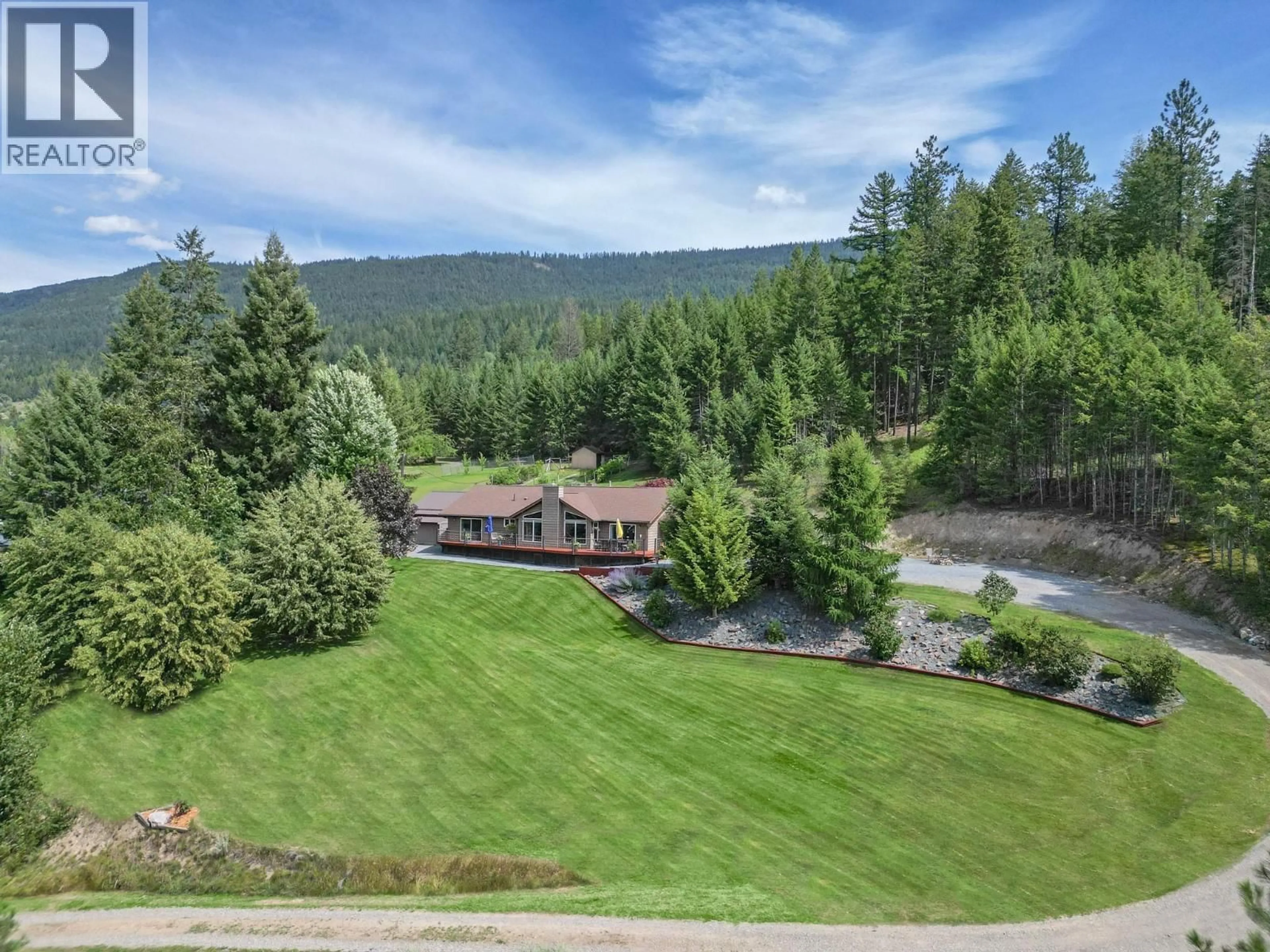 A pic from outside/outdoor area/front of a property/back of a property/a pic from drone, unknown for 5126 BOSSIO ROAD, Wynndel British Columbia V0B2N1