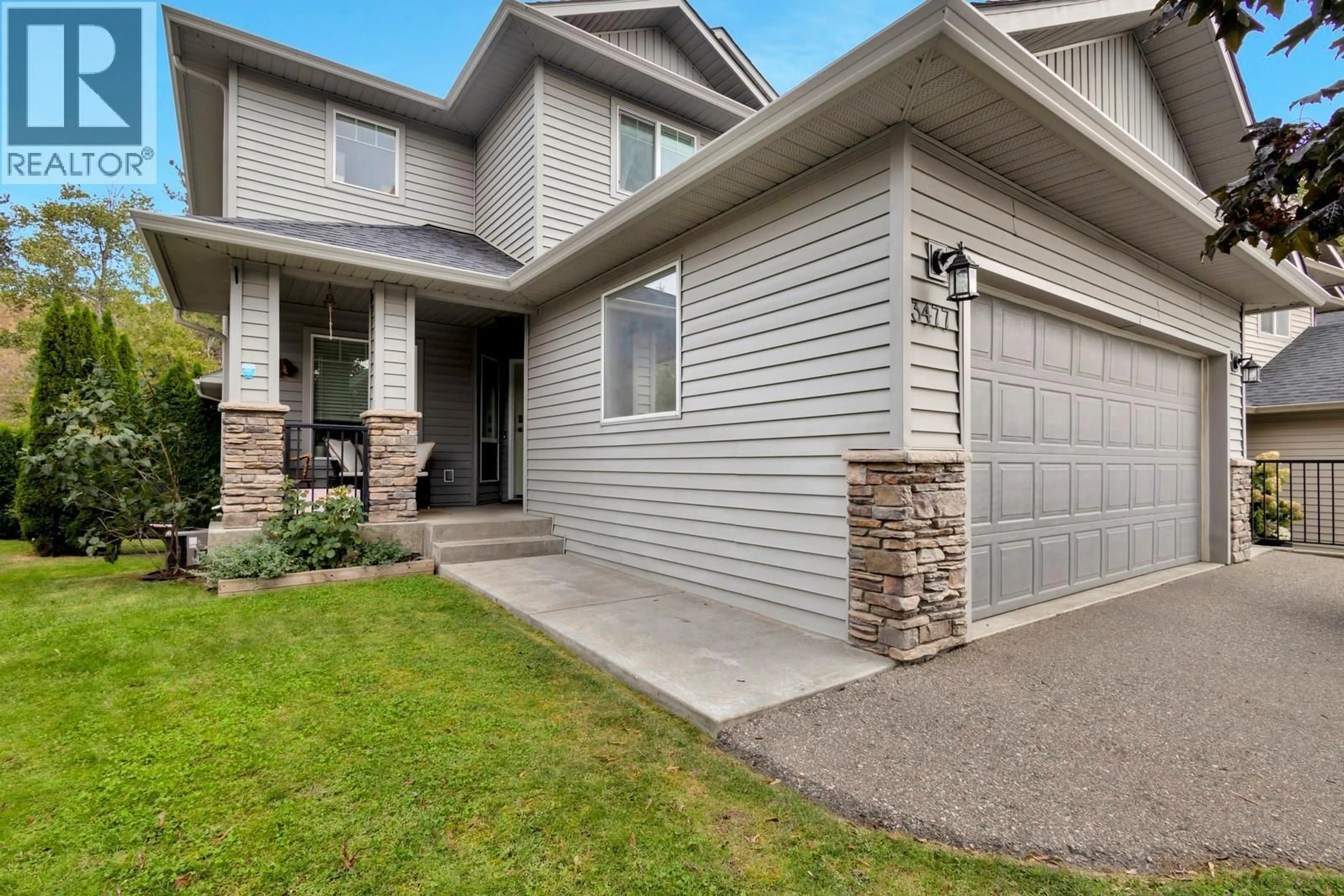 Home with vinyl exterior material, street for 3477 CREEKVIEW CRESCENT, West Kelowna British Columbia V4T3C5