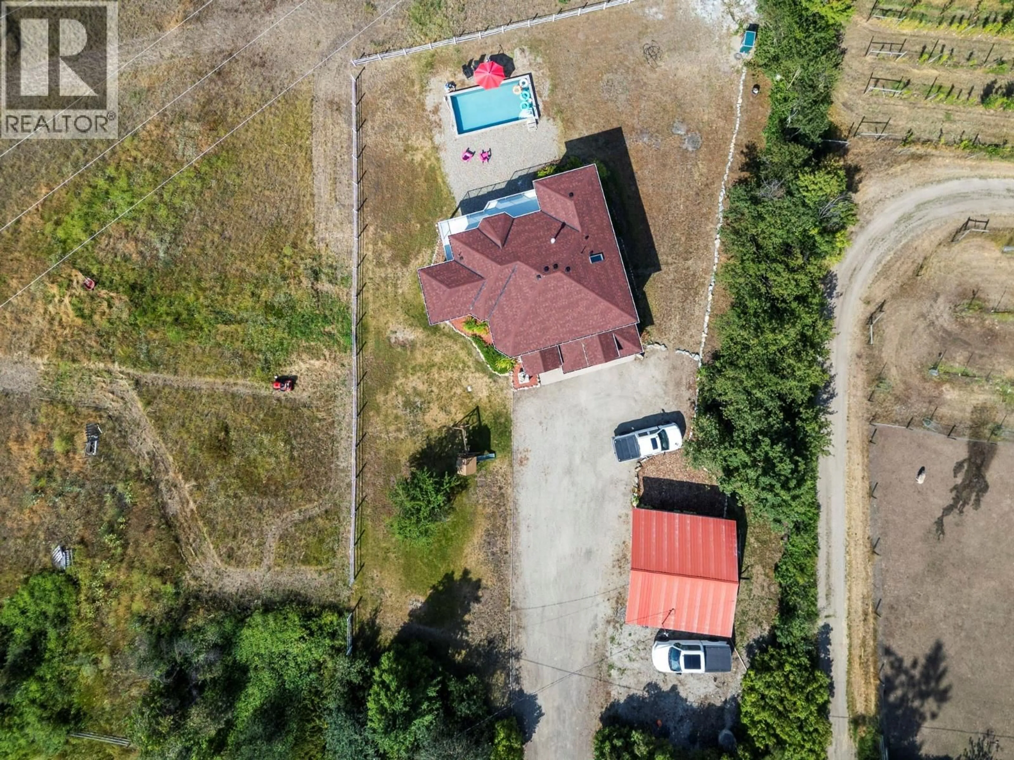 A pic from outside/outdoor area/front of a property/back of a property/a pic from drone, building for 5596 CURLEW ROAD, Vernon British Columbia V1B3J8