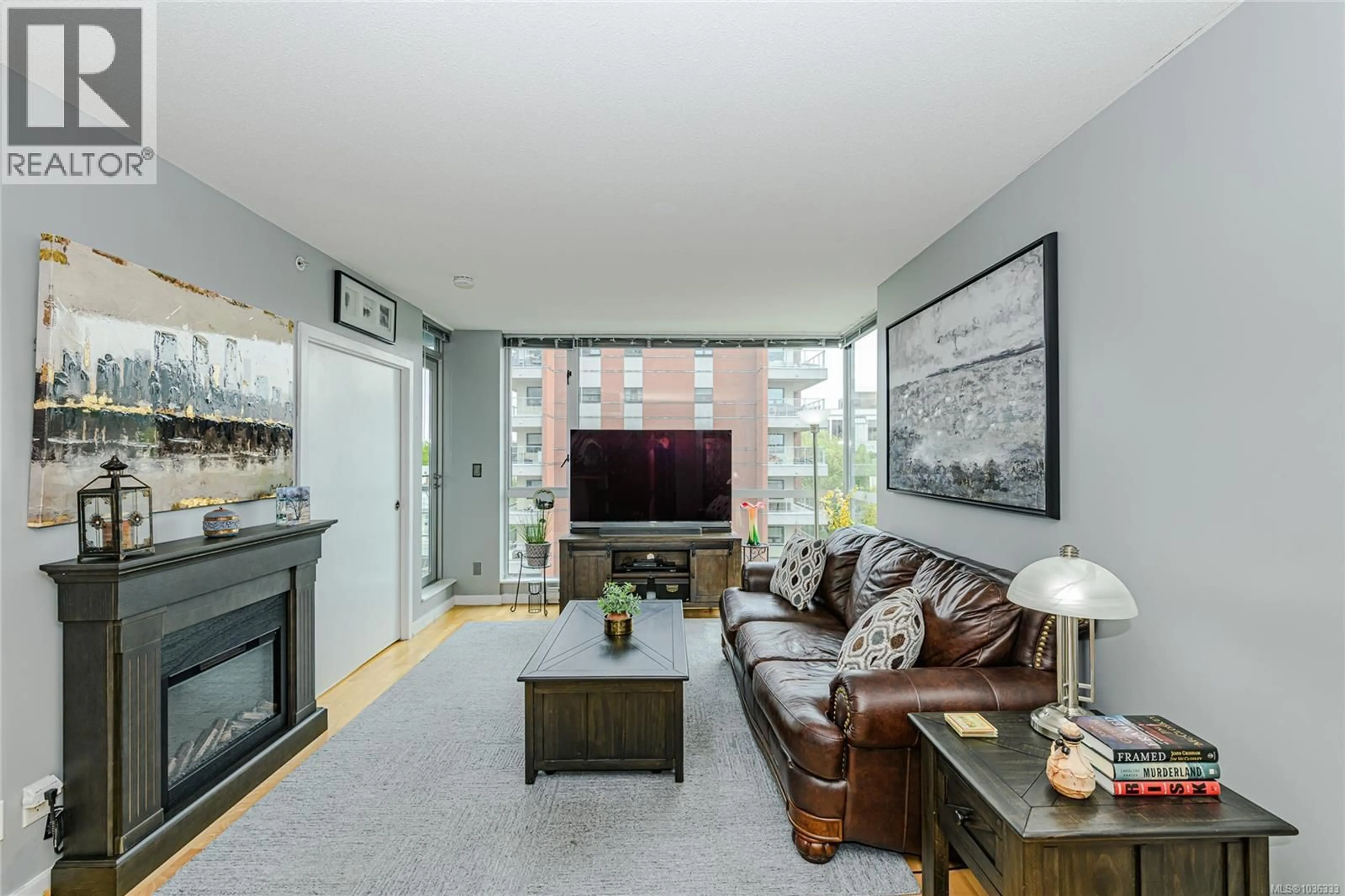 Living room with furniture, unknown for 705 - 732 CORMORANT STREET, Victoria British Columbia V8W1P8