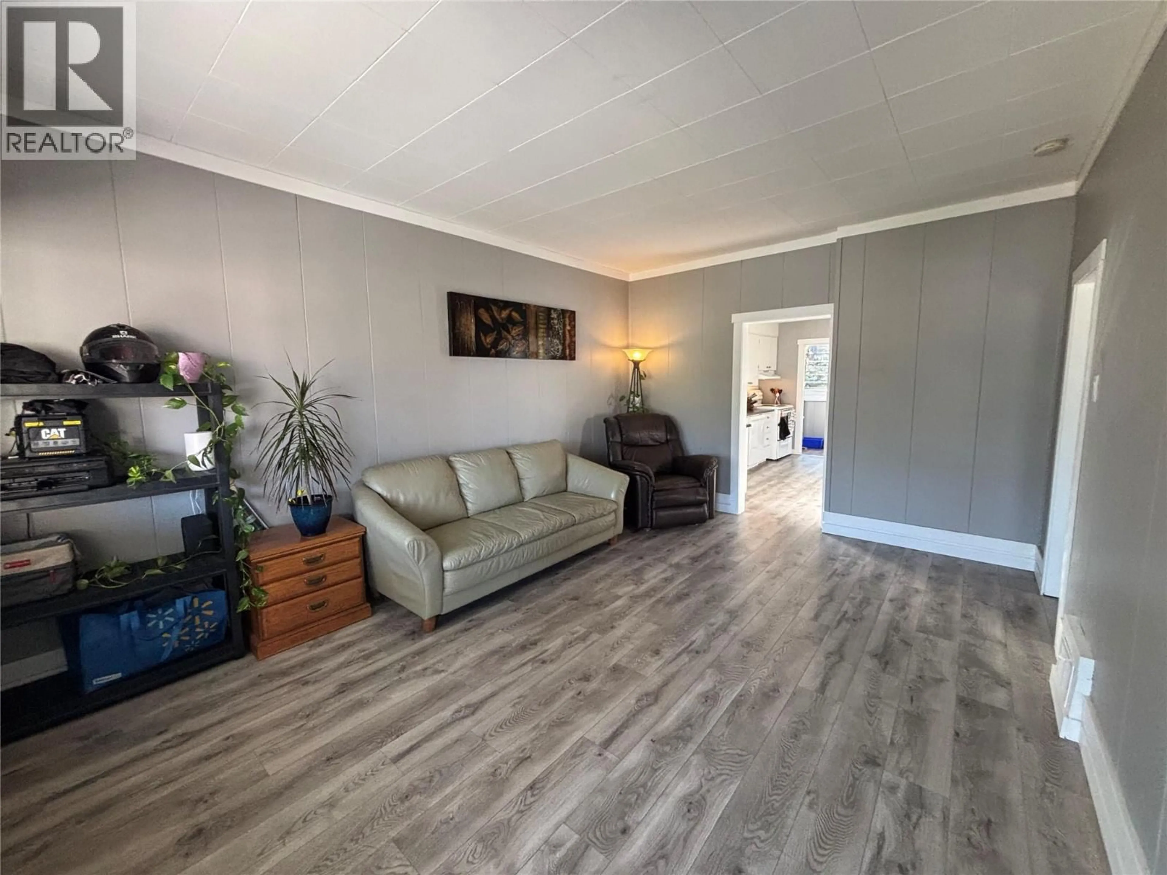 Living room with furniture, wood/laminate floor for 1170 NELSON AVENUE, Trail British Columbia V1R3H5