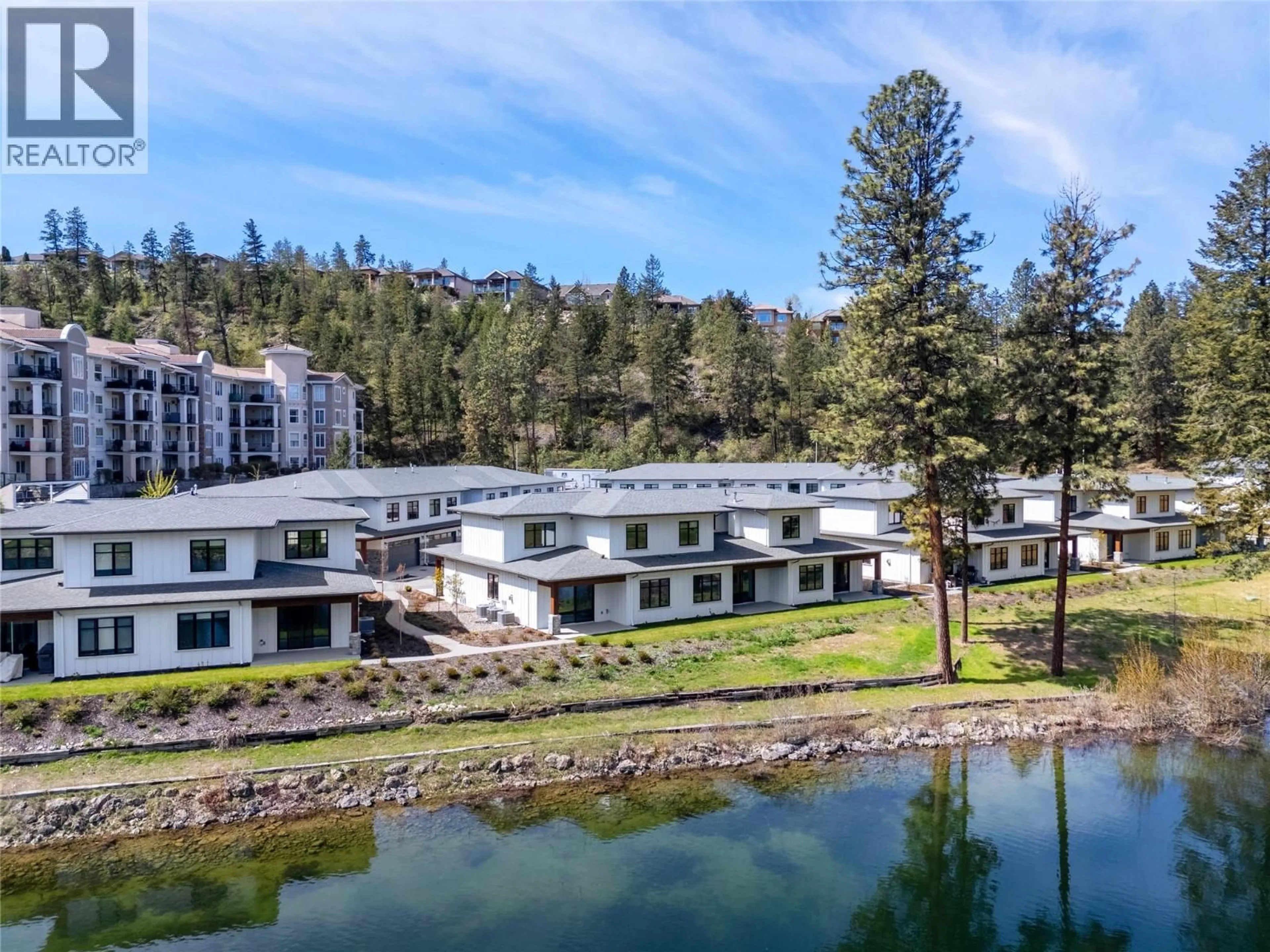 A pic from outside/outdoor area/front of a property/back of a property/a pic from drone, water/lake/river/ocean view for 9 - 1979 COUNTRY CLUB DRIVE, Kelowna British Columbia V1X0H6