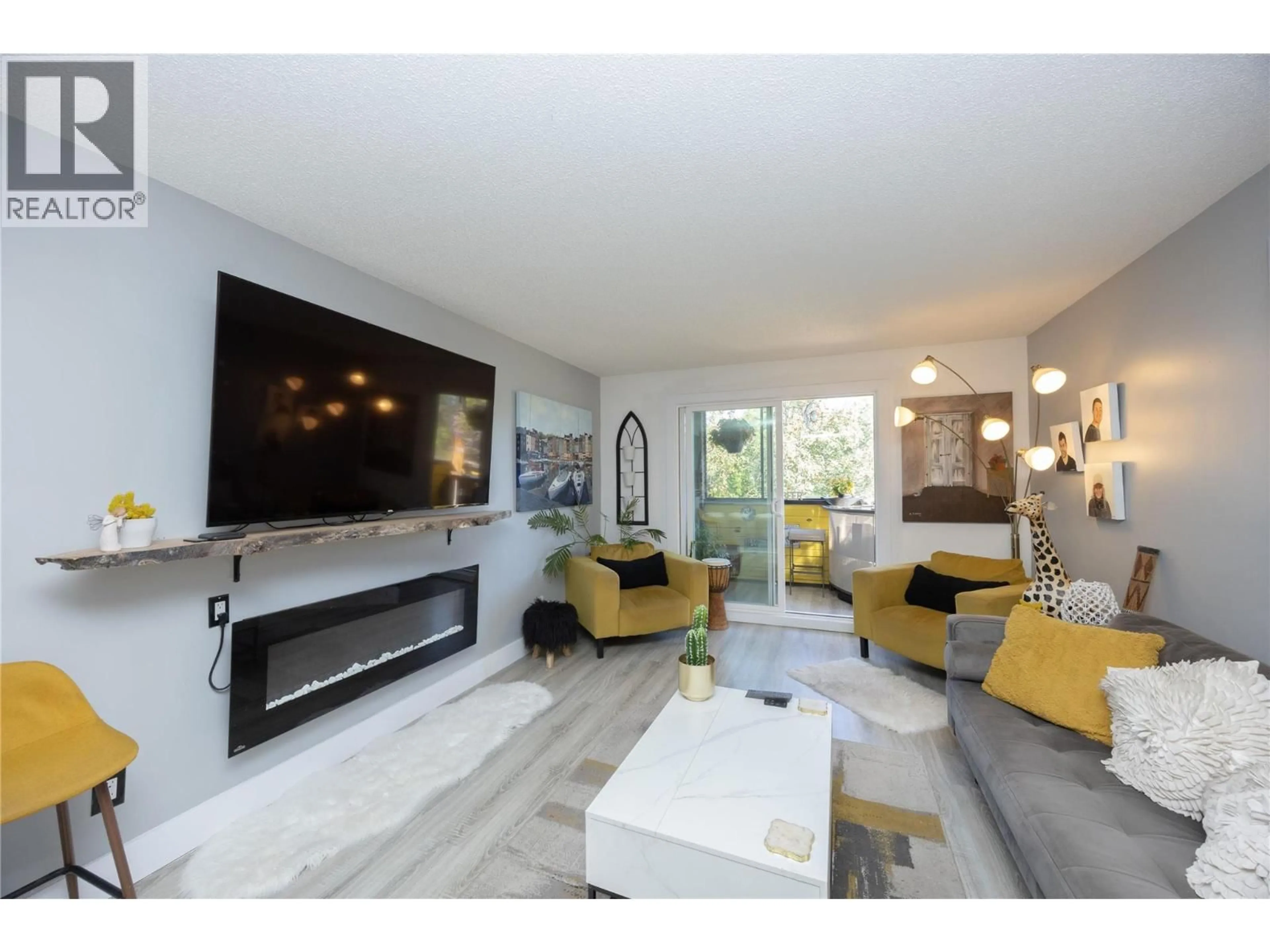 Living room with furniture, unknown for 206 - 1915 PACIFIC COURT, Kelowna British Columbia V1Y8B3