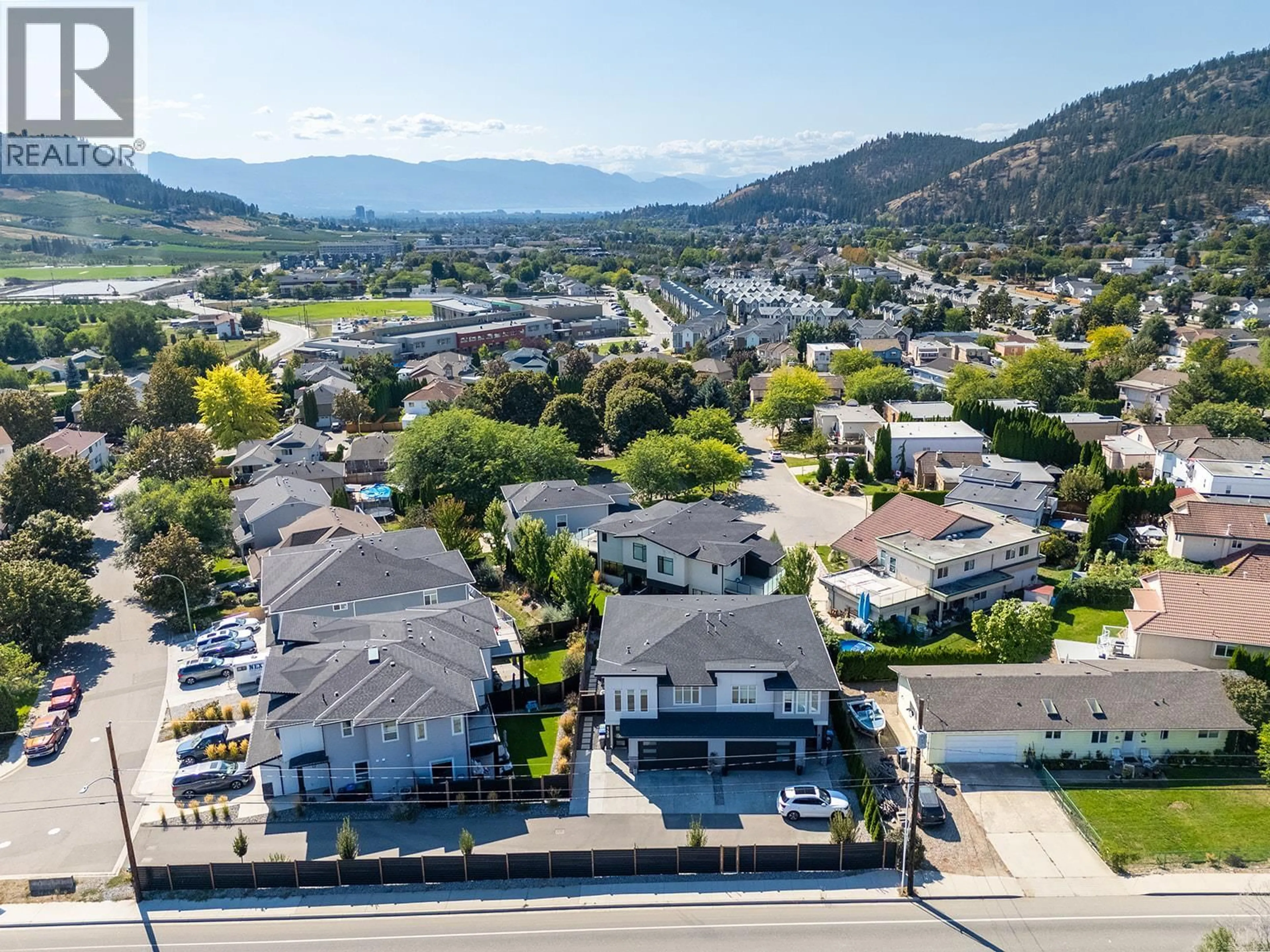 A pic from outside/outdoor area/front of a property/back of a property/a pic from drone, mountain view for 136 SUMMERHILL PLACE, Kelowna British Columbia V1V1T6