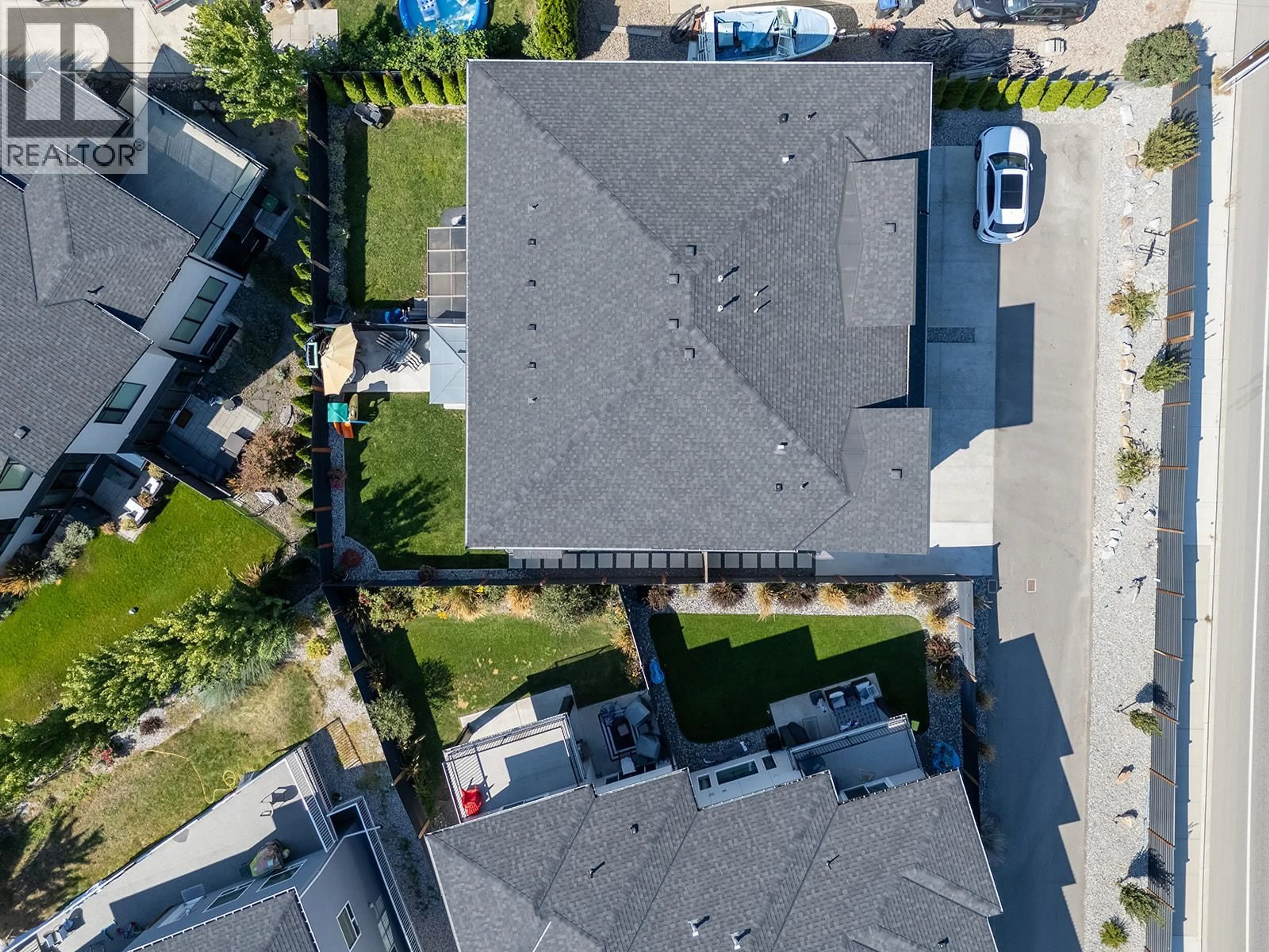 A pic from outside/outdoor area/front of a property/back of a property/a pic from drone, street for 136 SUMMERHILL PLACE, Kelowna British Columbia V1V1T6