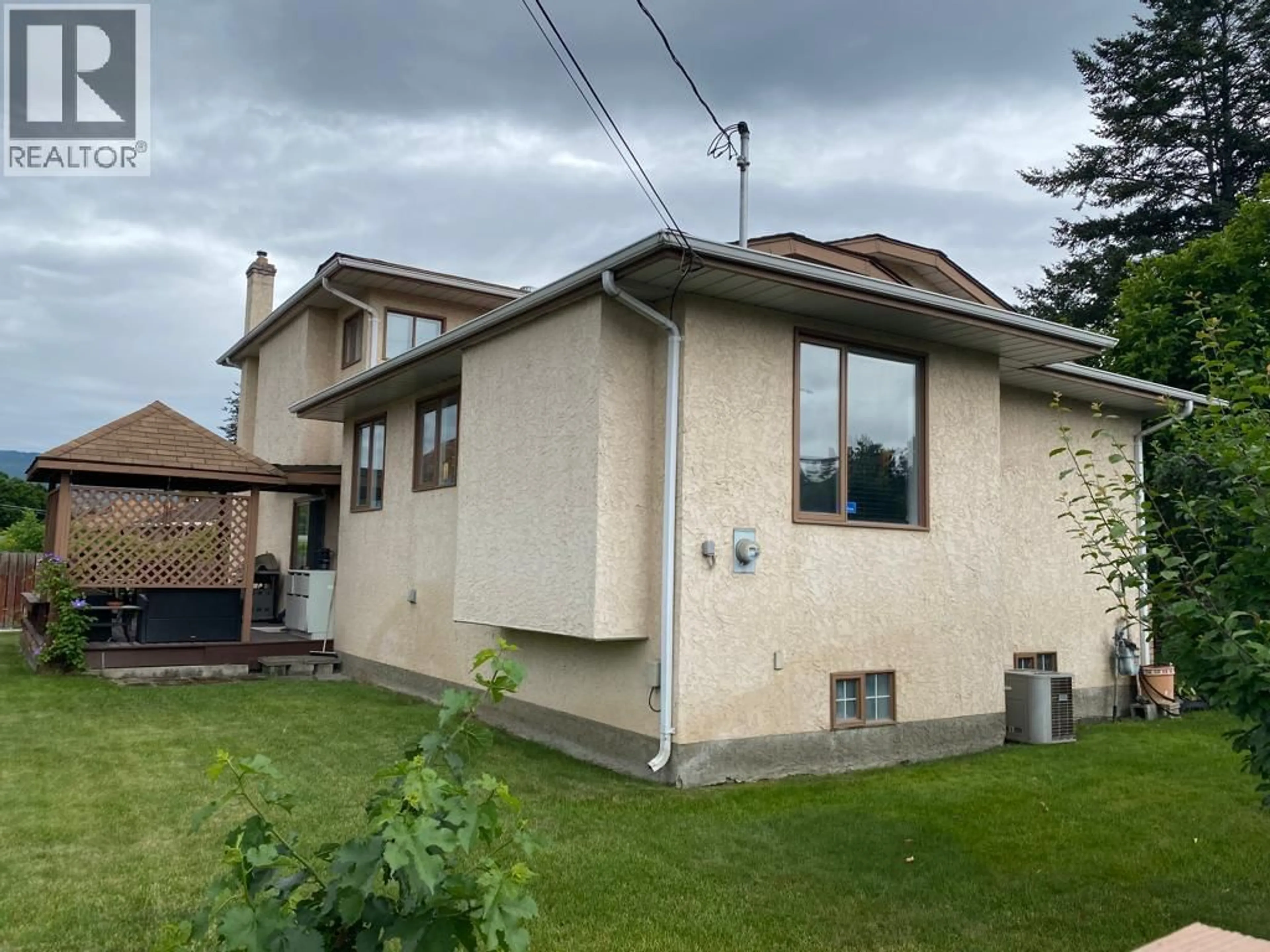 A pic from outside/outdoor area/front of a property/back of a property/a pic from drone, street for 3343 GORDON DRIVE, Kelowna British Columbia V1W3M9