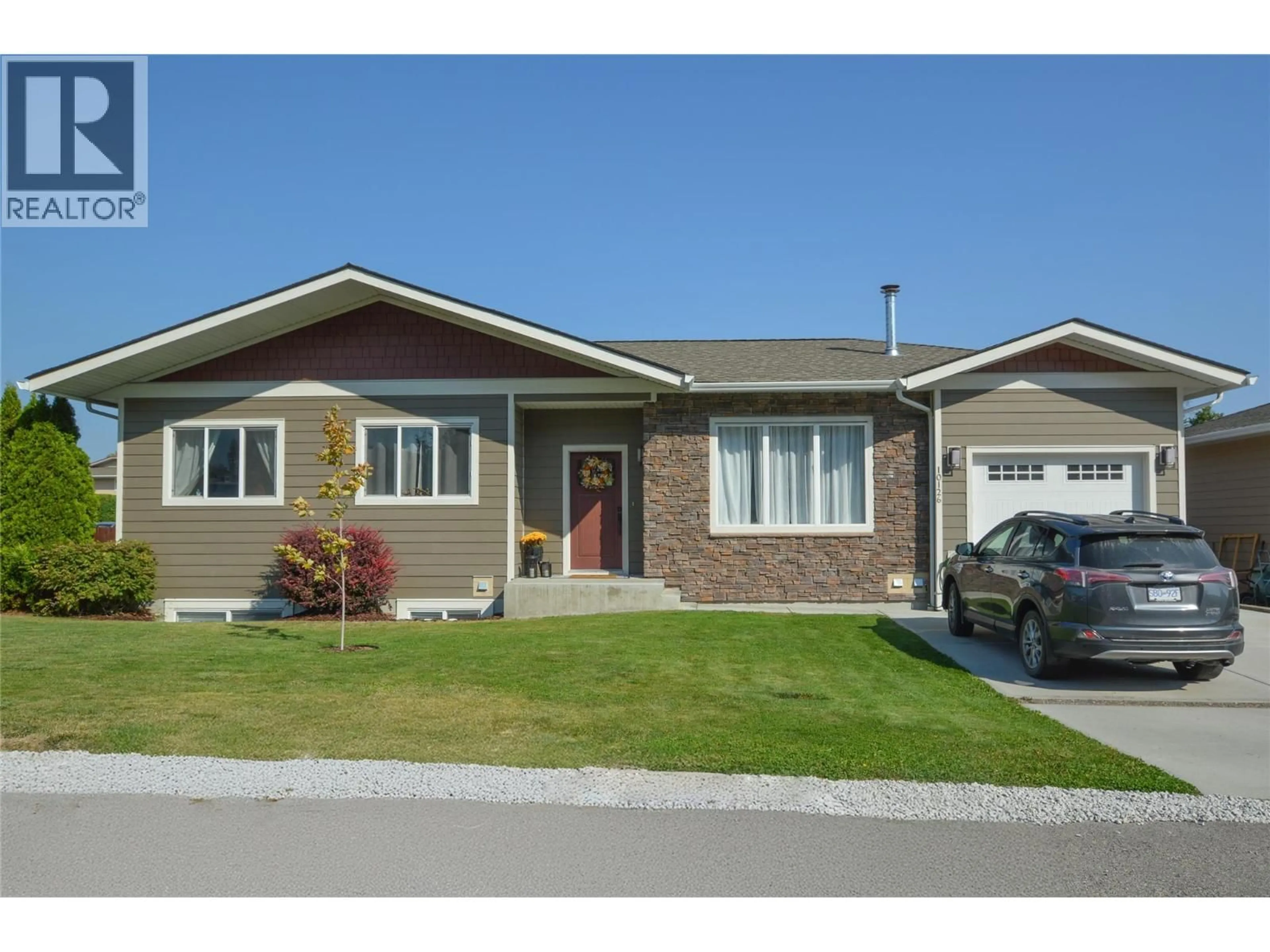 Home with vinyl exterior material, street for 10126 RAND STREET, Summerland British Columbia V0H1Z5