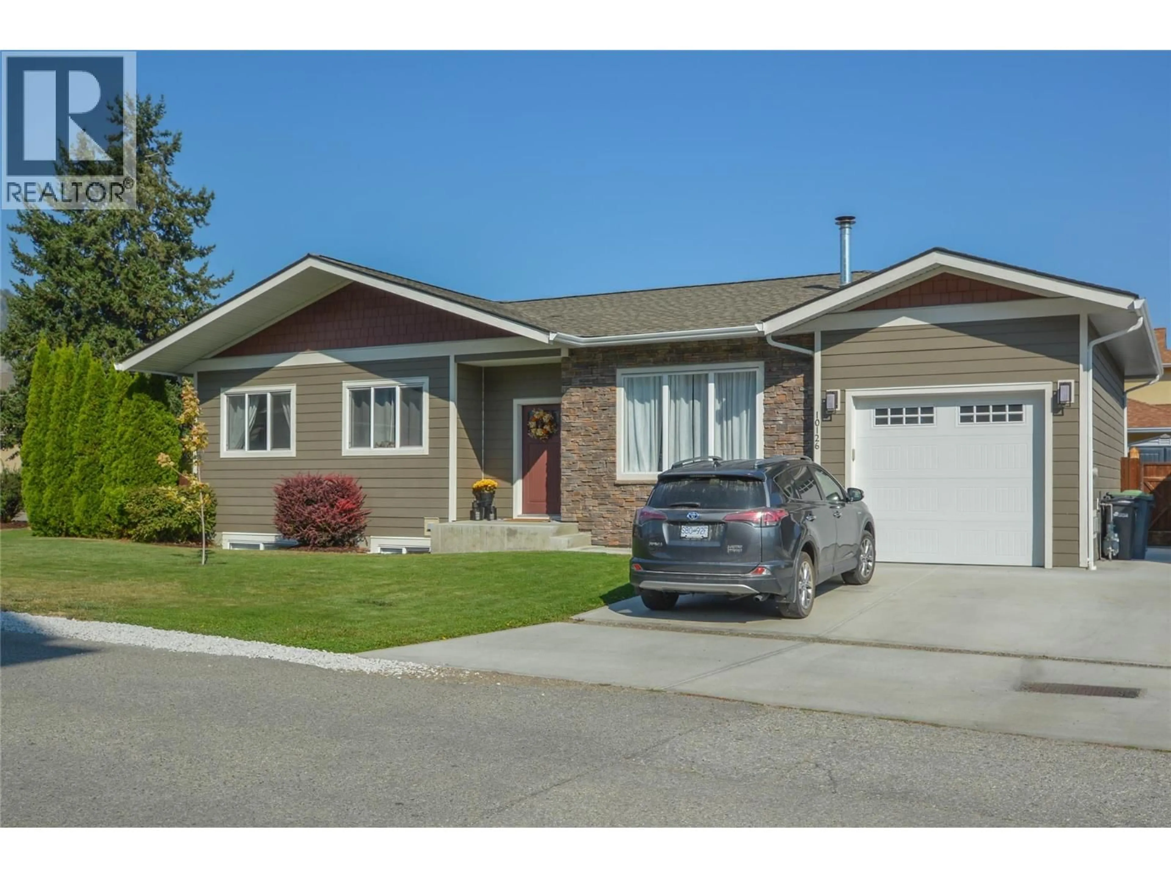 Home with vinyl exterior material, street for 10126 RAND STREET, Summerland British Columbia V0H1Z5