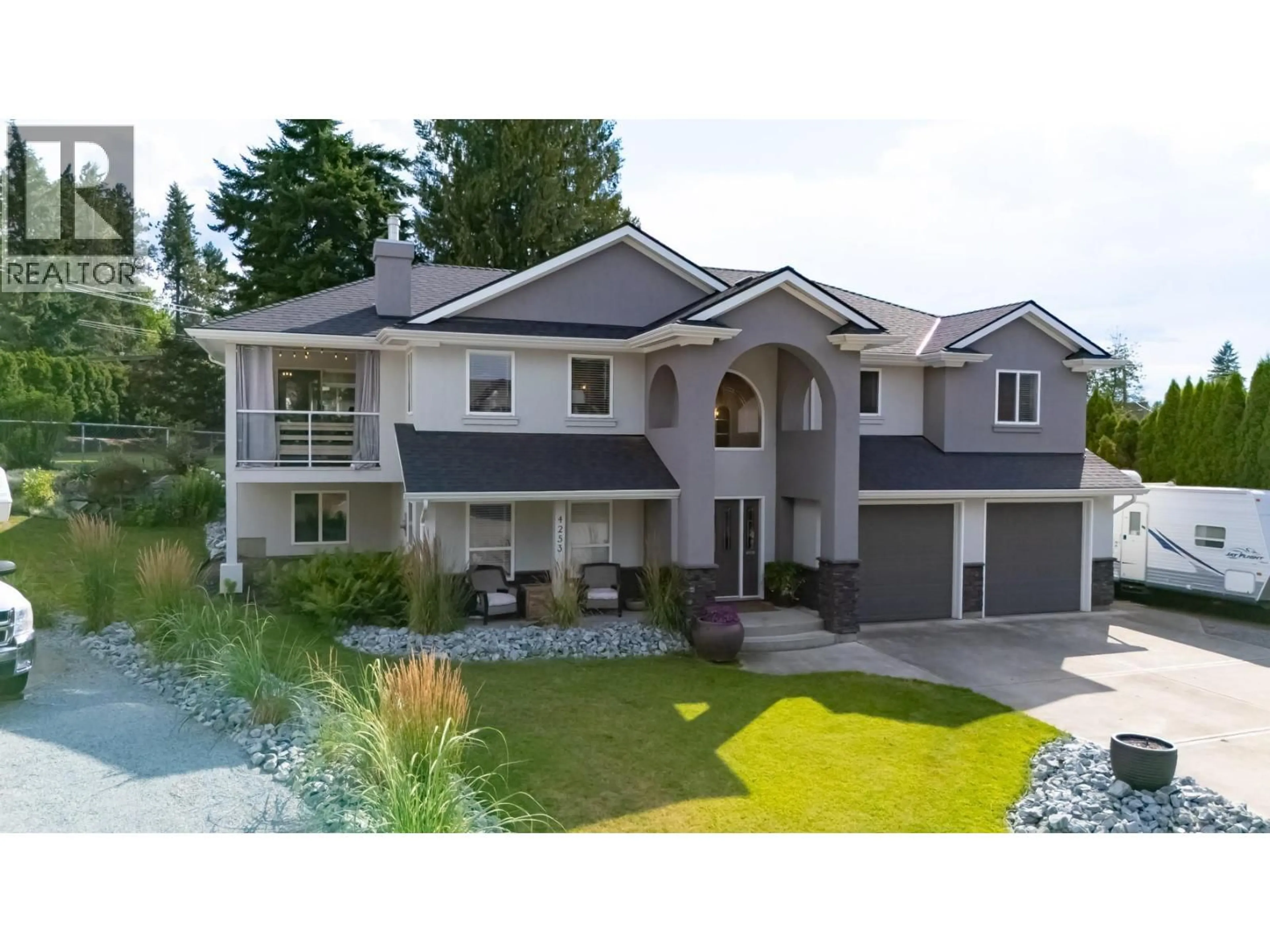Home with vinyl exterior material, street for 4253 ESO COURT, Kelowna British Columbia V1W4A4